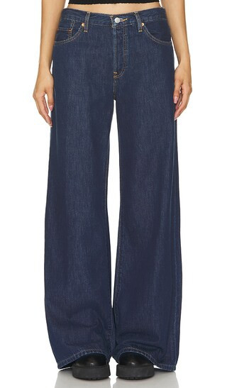 RE/DONE Mid Rise Palazzo in Blue. - size 25 (also in 23, 24, 26, 27, 28, 29, 31, 32) | Revolve Clothing (Global)