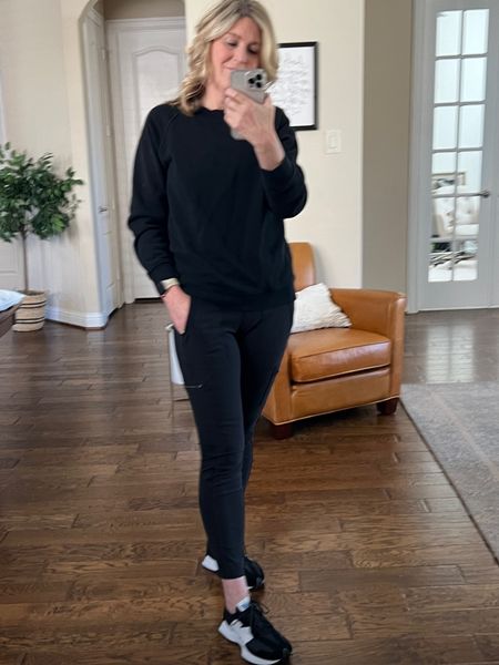 Athleisure all black look. Cargo leggings. FABULOUS! Great quality! Run tts. Lots of color options. Inexpensive sweatshirt. $15! Great quality! Athletic tank top. Another favorite of mine. Lots of color options. Runs tts. Favorite sneakers. Linking available options. 

#LTKtravel #LTKfindsunder100 #LTKshoecrush
