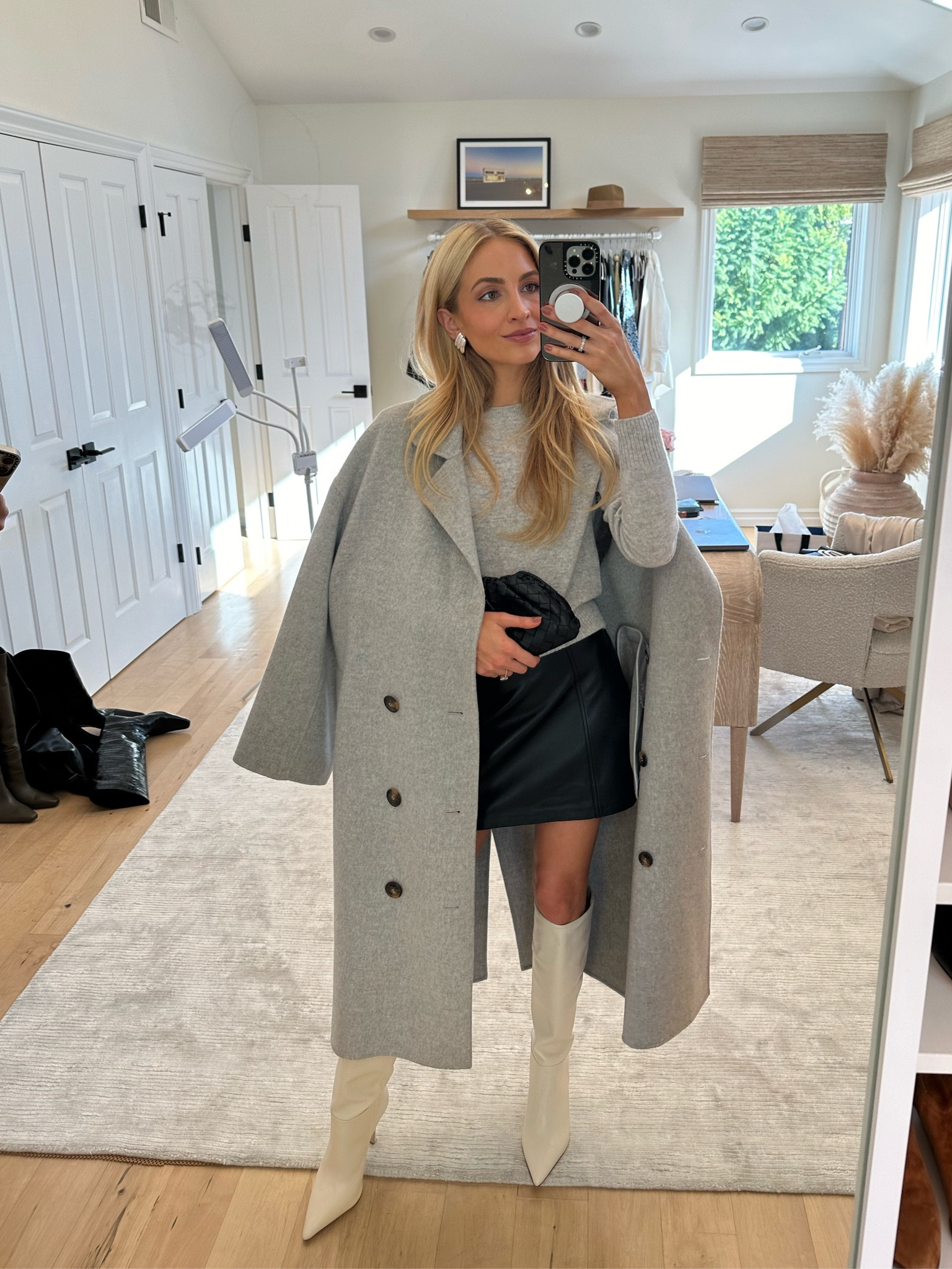 Paired this black mini skirt with a grey cashmere sweater from Reformation, my favorite oversized grey coat and ivory knee high boots 🤍

Sizes worn here:
Sweater XS (TTS)
Skirt XS (TTS)
Coat XS (oversized) 
Boots 9 (TTS - so comfy)

#LTKSeasonal #LTKshoecrush #LTKstyletip