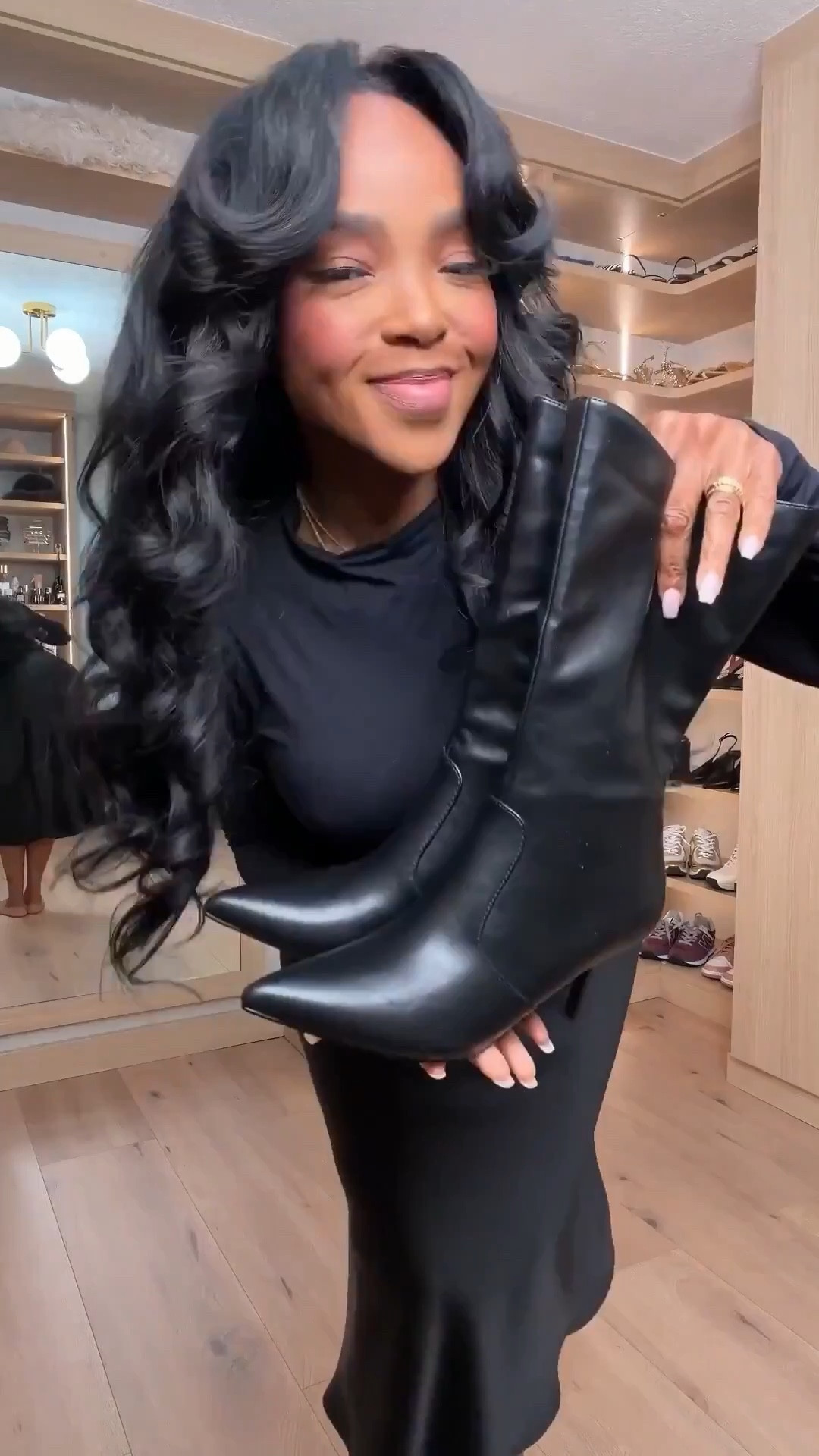 A timeless black-on-black look that always delivers — clean lines, flattering movement, and easy sophistication. This outfit is built around elevated basics you can rewear endlessly, making it a smart long-term shopping choice where the cost per wear truly adds up. Styled once here, but easily mixed with other staples in your closet.

Perfect for workdays, casual meetings, dinner dates, travel days, or everyday polished errands.

📏 Sizing:
Top: Size Small  
Skirt: Size Small  
Boots: True to size  

📐 Measurements: 5'4" | 138 lbs | 34D bust | 27" waist | 40" hips  

Shop instantly on the app and grab this look while everything is still in stock.  
Save this post — it’s one of those outfits you’ll reach for again and again.

Black outfit inspiration, elevated everyday style, capsule wardrobe essentials, chic fall outfits, polished neutral looks, versatile wardrobe staples, cost per wear fashion.

Follow me on Instagram and YouTube @kirasfashionfinds