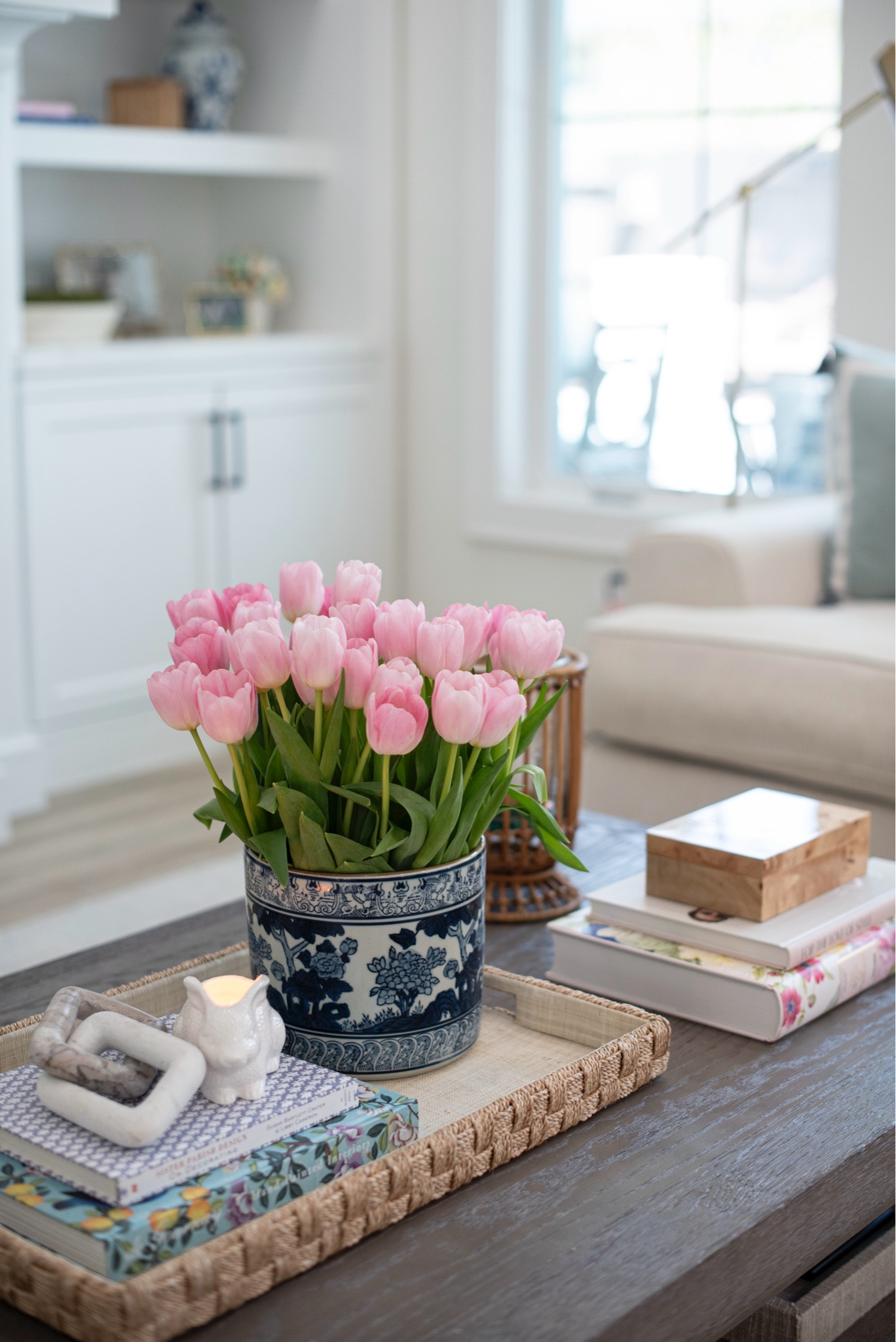 Coffe table styling using woven tray for Easter and Spring

#LTKhome #LTKfamily #LTKSeasonal