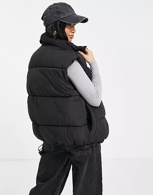 Topshop Petite oversized sleeveless puffer vest in black | ASOS (Global)