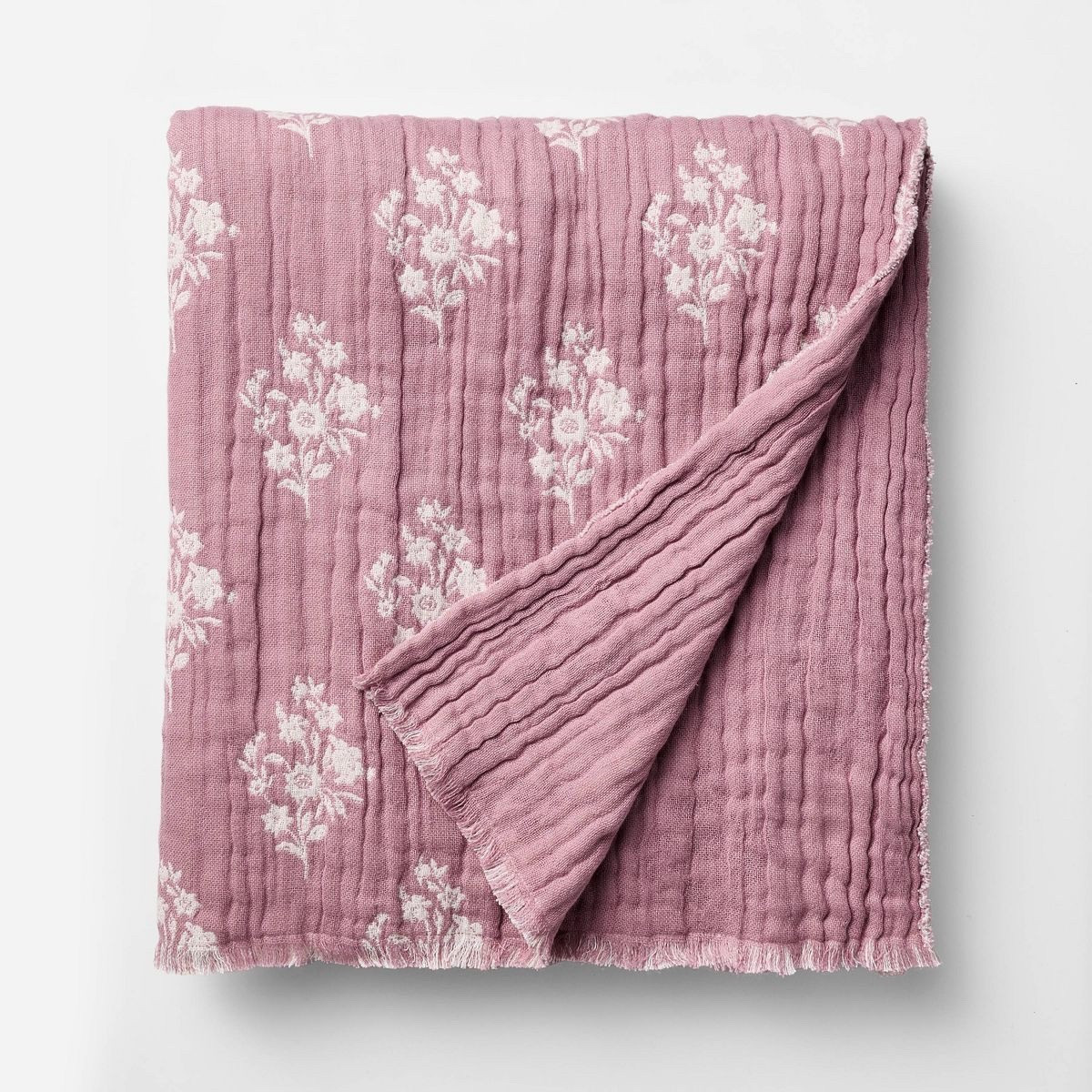 Threshold™ x Studio McGee Floral Block Print Jacquard Throw. Featuring a charming purple and cream floral block pattern, this throw adds a touch of elegance and warmth to any space.

#LTKFindsUnder50 #LTKHome #LTKSaleAlert