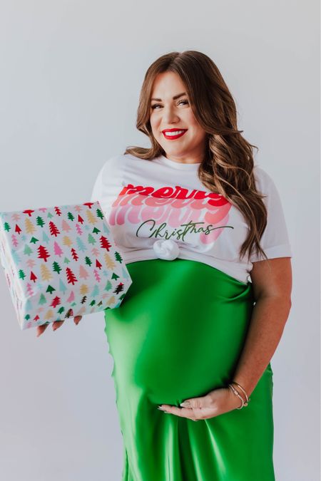 curvy merry merry merry Christmas graphic tee and kelly green satin skirt! part of my Merry Pinkmas collection with Pink Desert! i’m in the xxl in tee and 2X in skirt (has an elastic waistband), typically would take the large not pregnant. runs TTS!  🎄🩷


#LTKHoliday #LTKmidsize #LTKfindsunder100