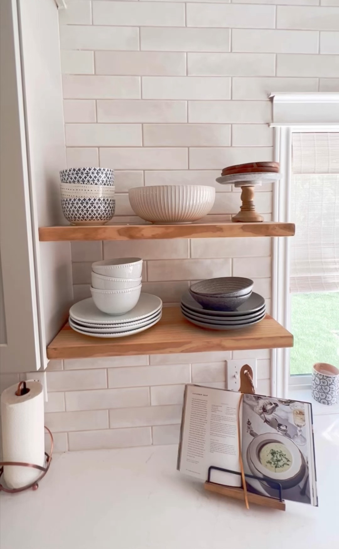 Kitchen open shelves styling // backsplash tile // kitchen wall sconces // dinnerware // acacia plates // open shelving // kitchen decor // transitional style

#LTKVideo #LTKhome