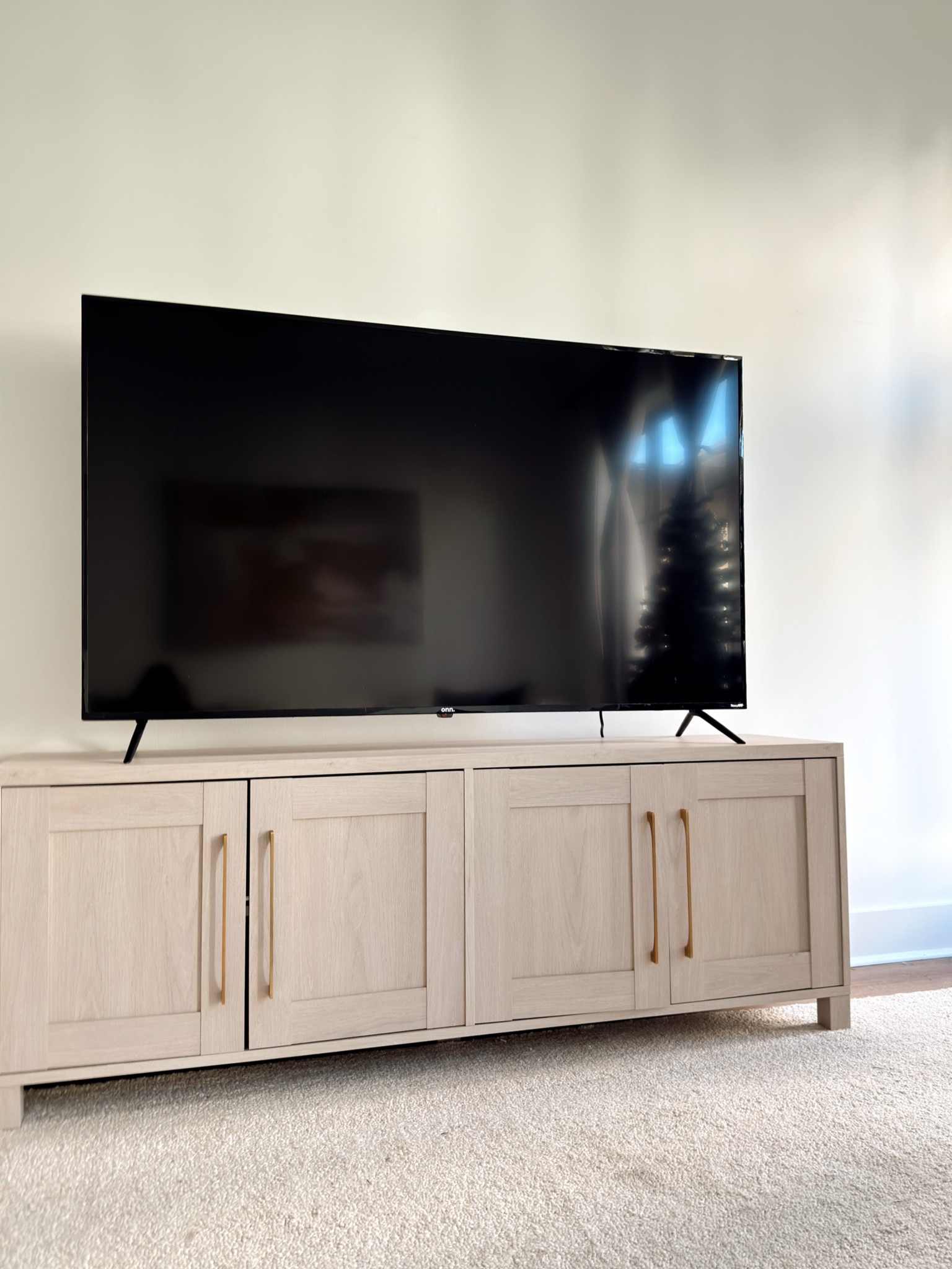 my tv stand- the color is a super pretty light gray and the goolf bronze handles are so pretty

#LTKHome