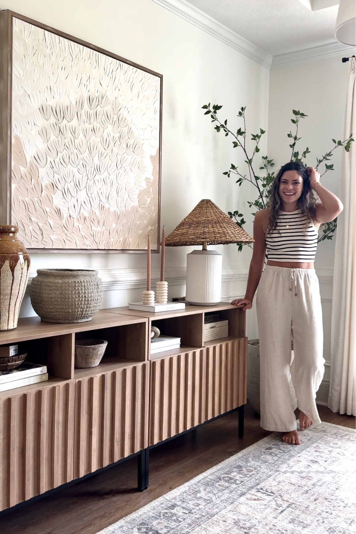 Console styling
Citrus tree
Wall art
Rug 
Sideboards
 Console 
Cabinet 

#LTKhome