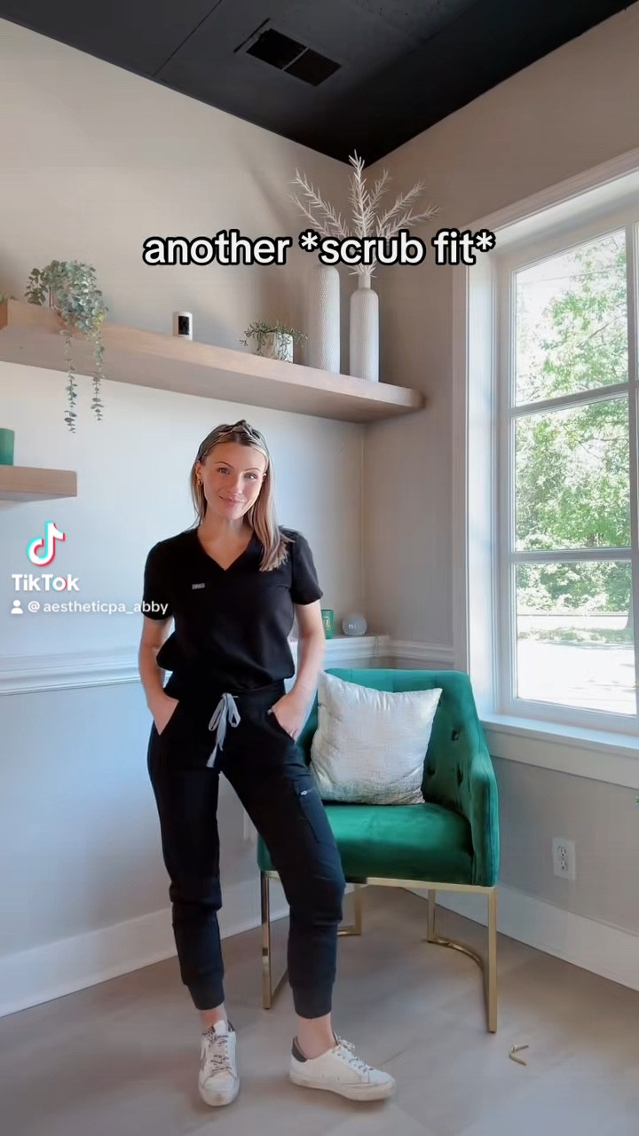 A classic black scrub outfit with the perfect accessories is one of my favorite work looks. This Figs jogger and v neck top is a staple for all healthcare girlies! My Golden Goose’s aren’t sold anymore, but I posted a similar pair with the matching headband ✨🥂

#LTKWorkwear