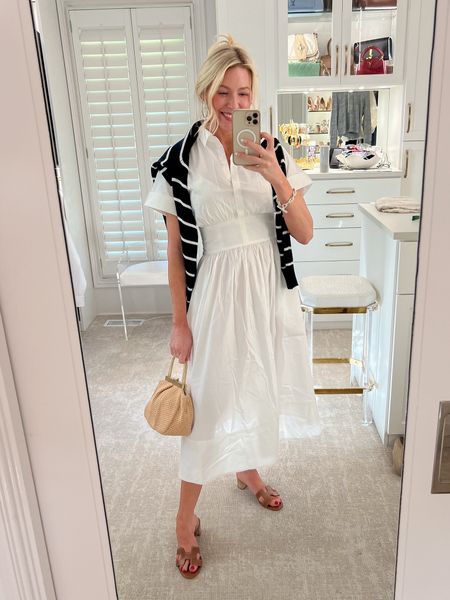 White shirt dress is a cute graduation outfit or summer party look! Pair with a navy and white striped sweater, gold Hermes Oran sandals, and a wicker handbag!

#LTKshoecrush #LTKSeasonal #LTKparties