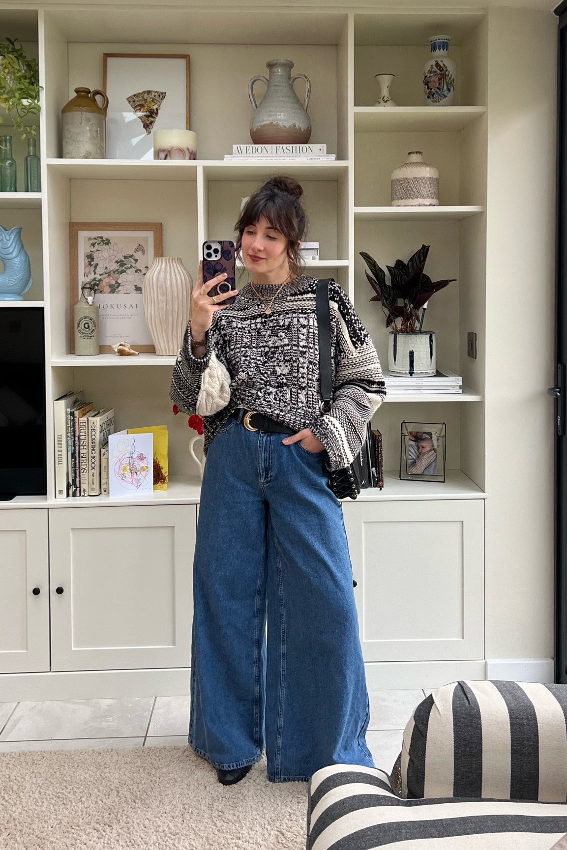 Wide jeans and knit jumper in sale 

#LTKsalealert #LTKSeasonal #LTKstyletip