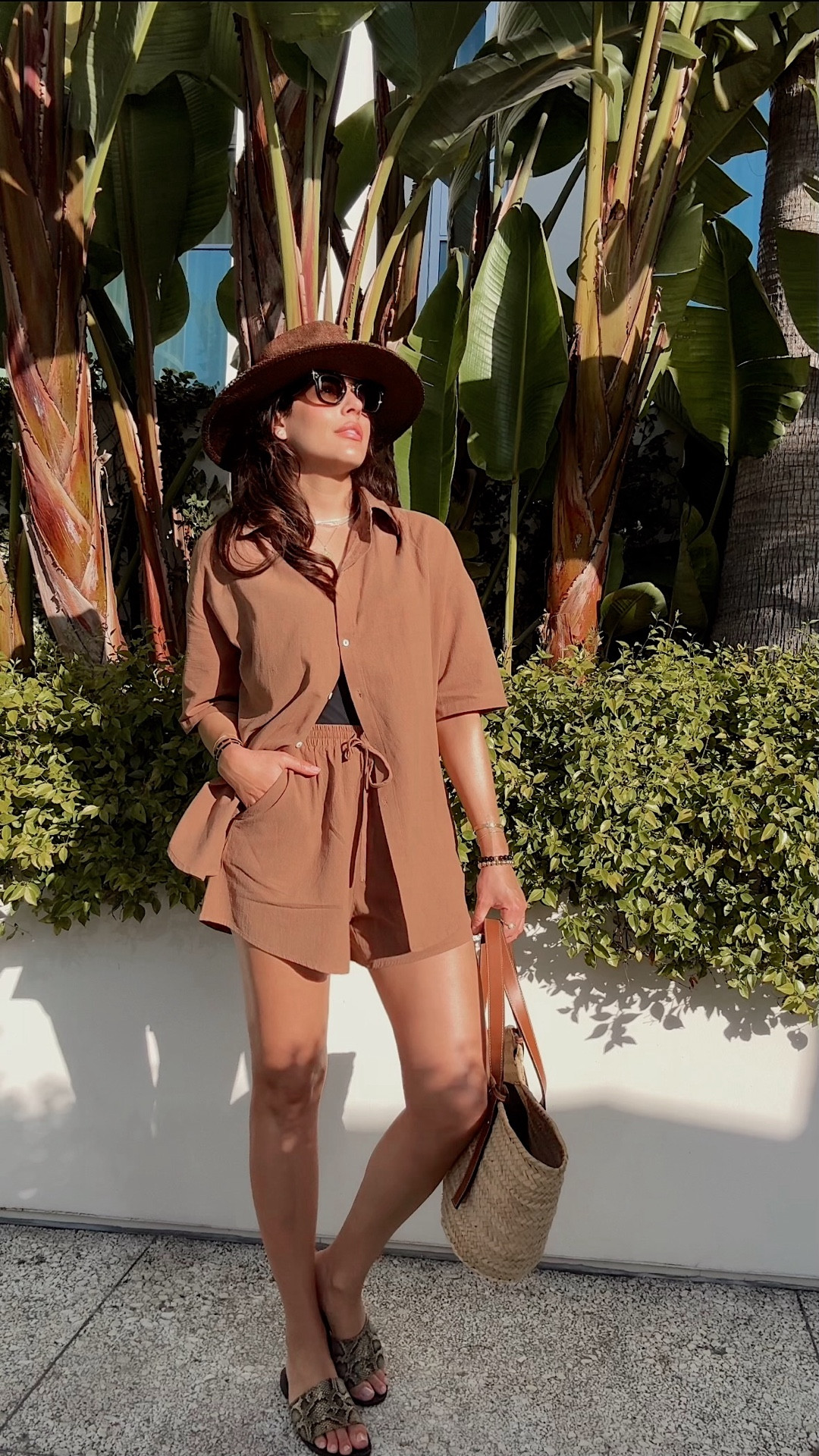 Vacation-ready & under $50 – this Amazon brown set is the ultimate high-low fashion find. Wear it as a beach cover-up or style it for lunch with my go-to python print sandals and elevated accessories. Chic, effortless, and affordable. Comment “SHOP” for links! #AmazonFinds #VacationStyle #HighLowFashion #VacationOutfit #MatchingSet #AmazonFashion