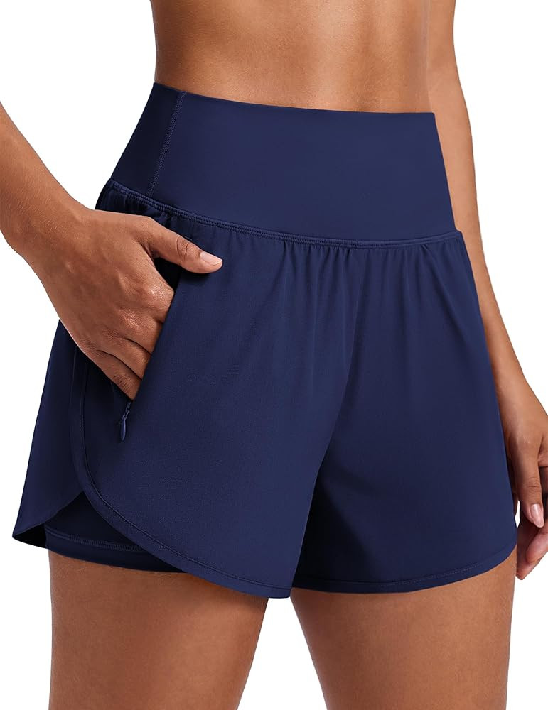 PINSPARK Women's 2 in 1 High Waisted Athletic Running Shorts 3" Dolphin Hem Quick Dry Workout Gym... | Amazon (US)