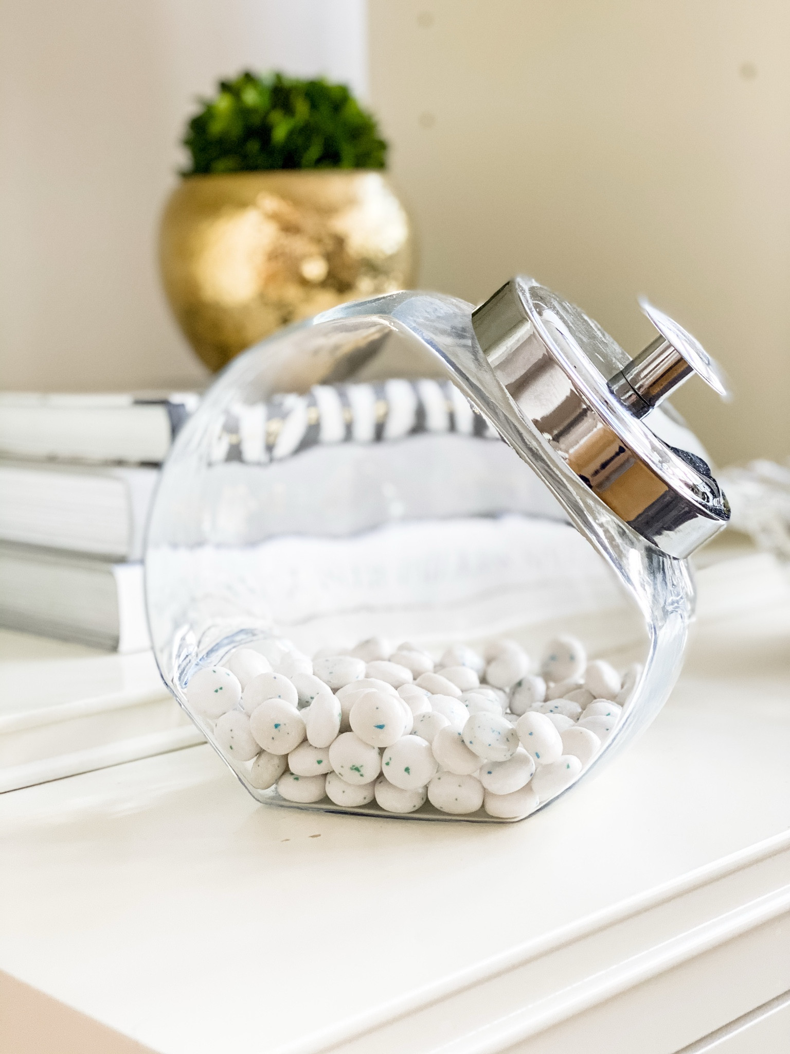 Transform everyday items like this stylish glass candy jar into functional decor! I love using it in our family room to add a touch of charm while keeping things organized. Fill it with treats, decorative accents, or even seasonal items for a simple yet elegant look. It's all about blending style with practicality! #HomeDecorInspo #OrganizedLiving #FamilyRoomStyle


#LTKStyleTip #LTKHome