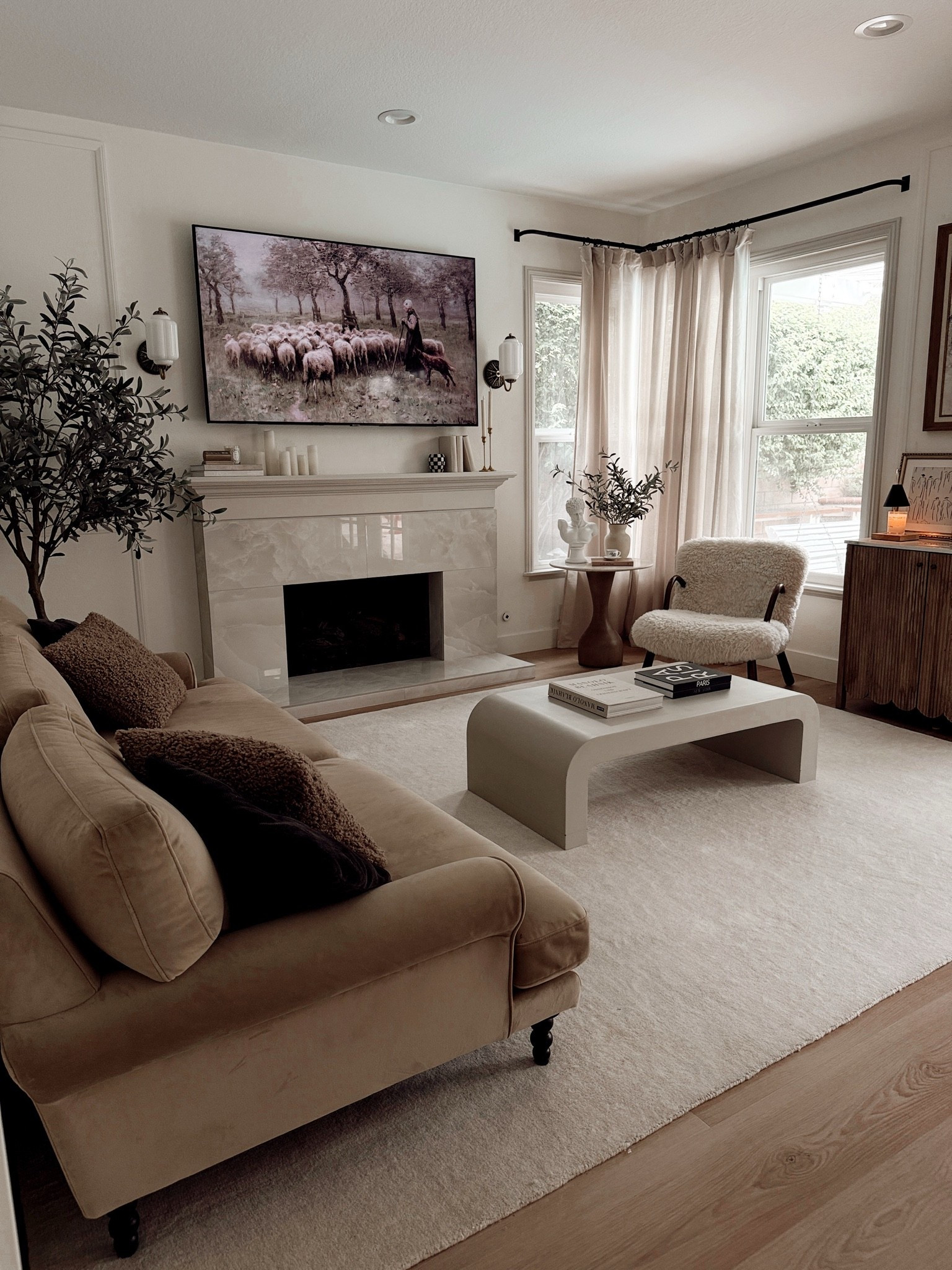 Modern Vintage Living Room

Neutral living room decor • modern vintage style • California casual interiors • Anthropologie sconces • white area rug • rugs USA • neutral brown sofa

#LTKHome
