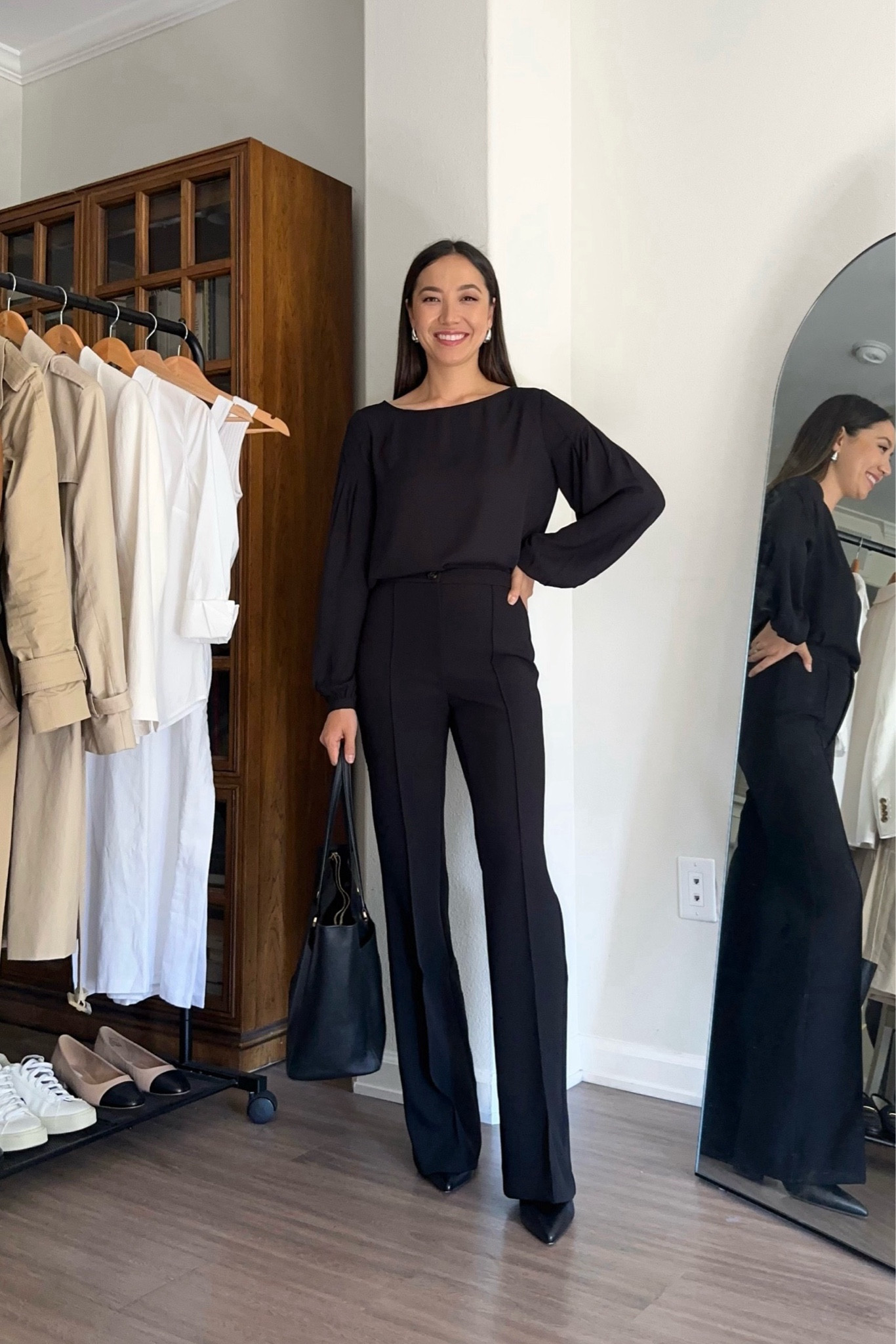Fall monochrome workwear outfit - all old pieces, linked to similar styles 

Black long sleeve blouse 
Black flare pants 
Heels 
Work tote bag 

#LTKSeasonal #LTKStyleTip #LTKWorkwear