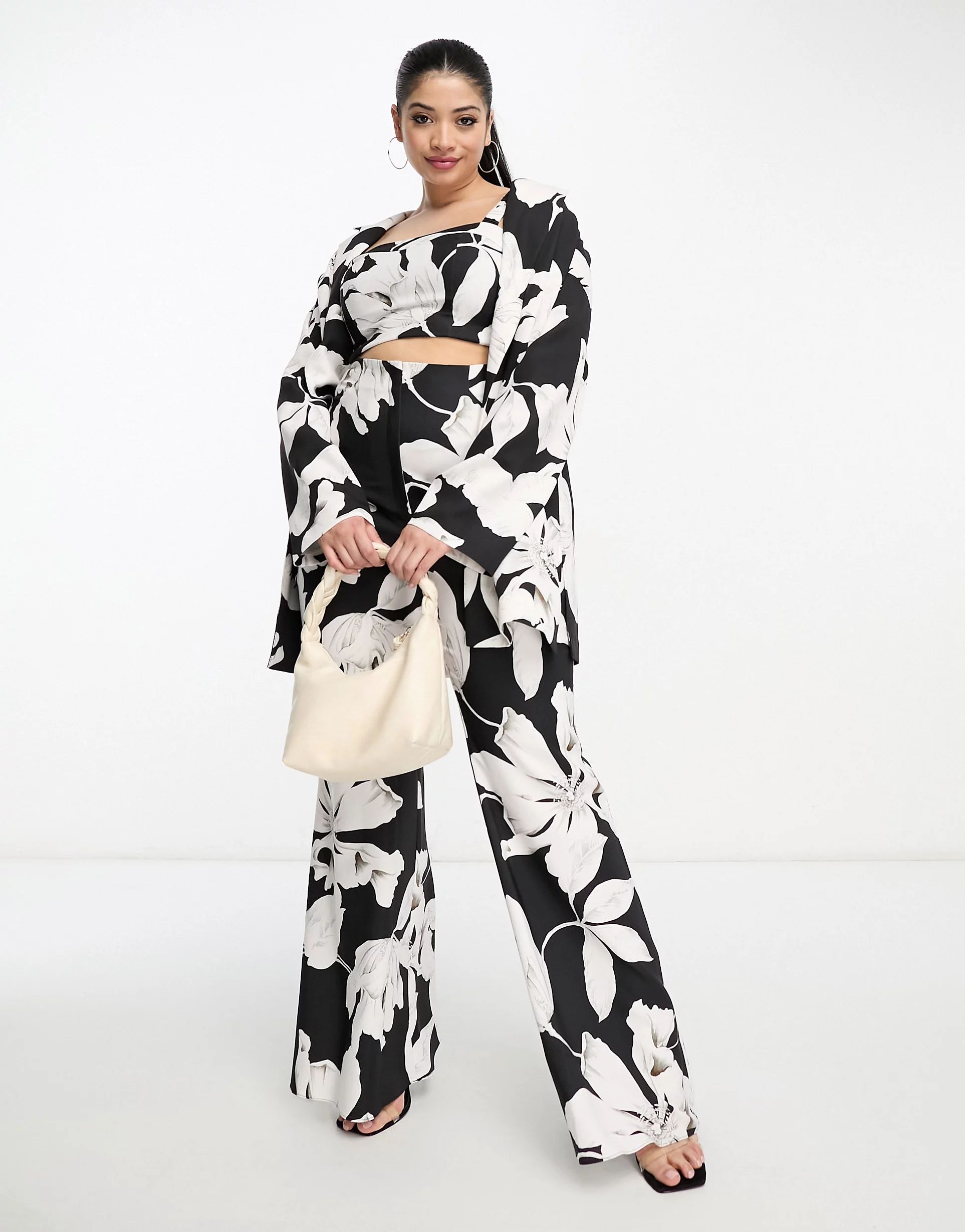 ASOS LUXE Curve flared suit pants in black & white floral print - part of a set | ASOS (Global)