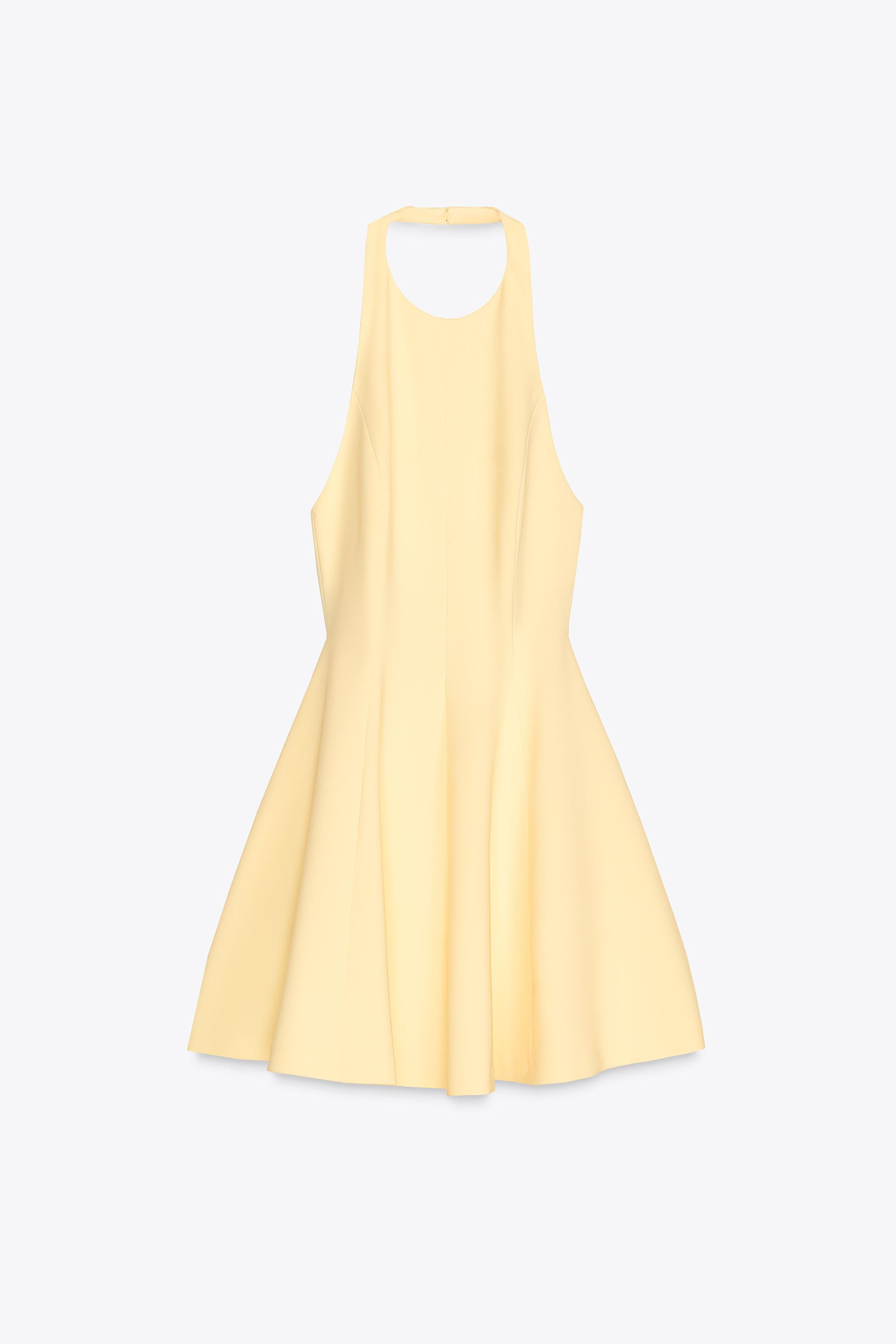 Short halter neck dress. Open back. Hidden in-seam side pockets. Matching inner lining. Back clos... | Zara US