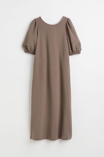 Calf-length dress in waffled, cotton-blend jersey. Low-cut back with horizontal ties and wide, el... | H&M (US)