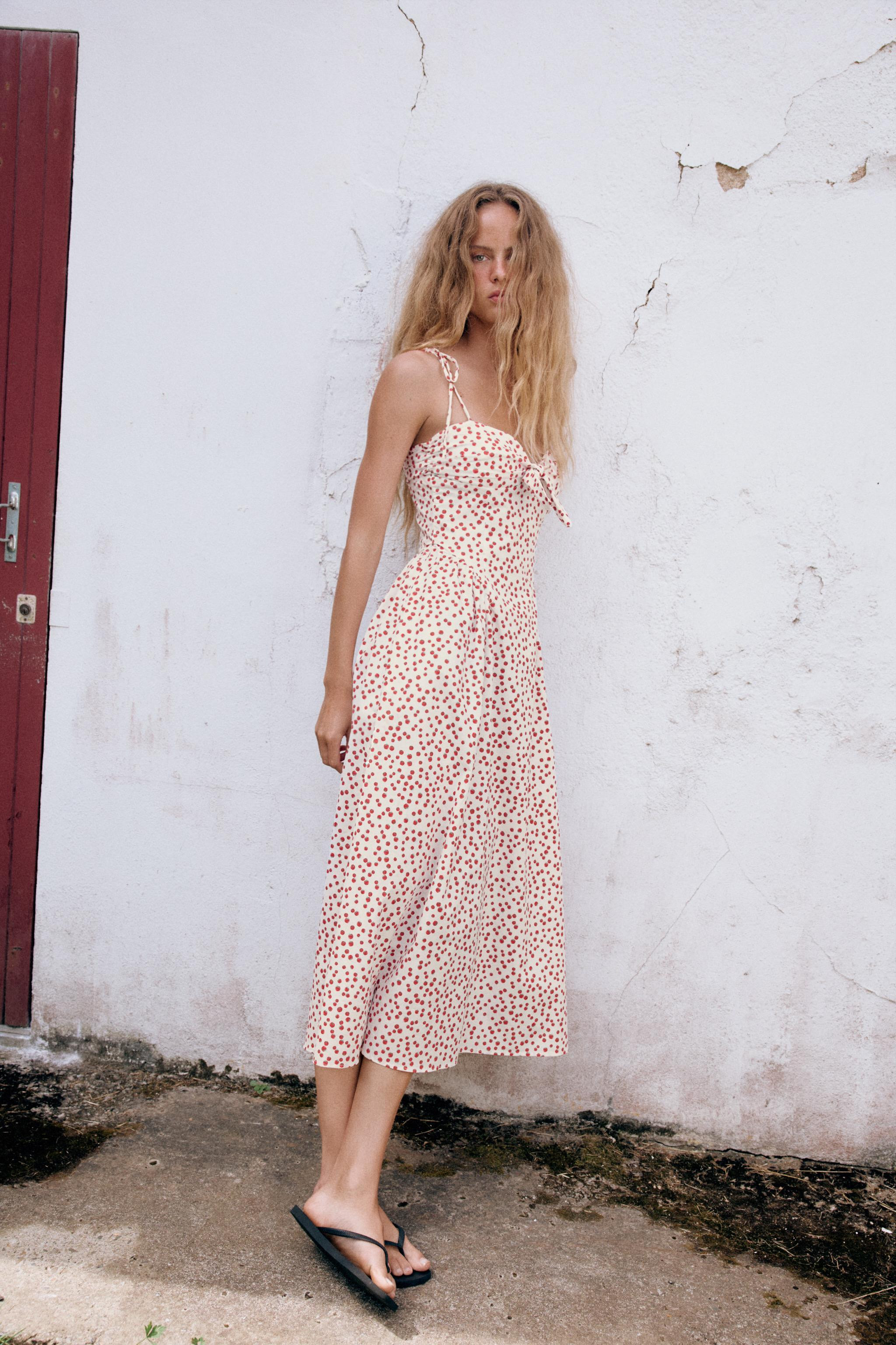 Midi dress with sweetheart neckline and spaghetti straps with tie details. Hidden in-seam side po... | Zara US