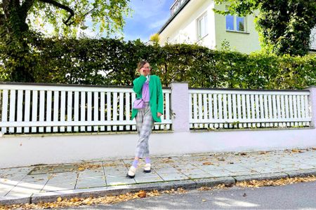 Plaid Pants. Girl with blond hair wearing plaid pants, oversized green blazer, lilac knit vest, geeky glasses, blouse, lilac mini bag, lilac socks and chunky loafers. #colorfuloutfit #colorfulstyle #colorfulfashion #colorfullooks #fashionfun #cutefalloutfit #fallfashion2022 #falllookbook #fitcheck #dailylooks #dailylookbook