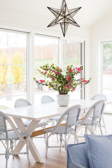 Looking for a quick idea to kickstart your home decor for summer? Try using some faux greenery or florals to add new life to your spaces! Loving this faux bougainvillea we used in our old pool house! It looks so cute with the blue and white bistro chairs, white dining table, star chandelier and white bubble pot!
.
#ltkhome #ltksalealert #ltkunder100 #ltkstyletip #ltkseasonal

#LTKSeasonal #LTKhome #LTKsalealert