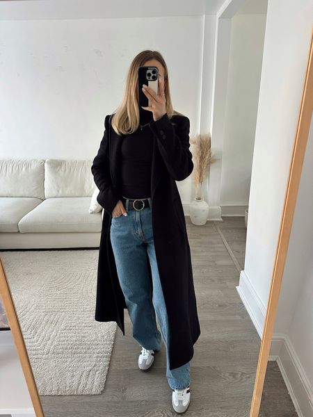 A casual look styling a long black coat with samba and straight leg jeans 

#LTKstyletip #LTKeurope #LTKSeasonal