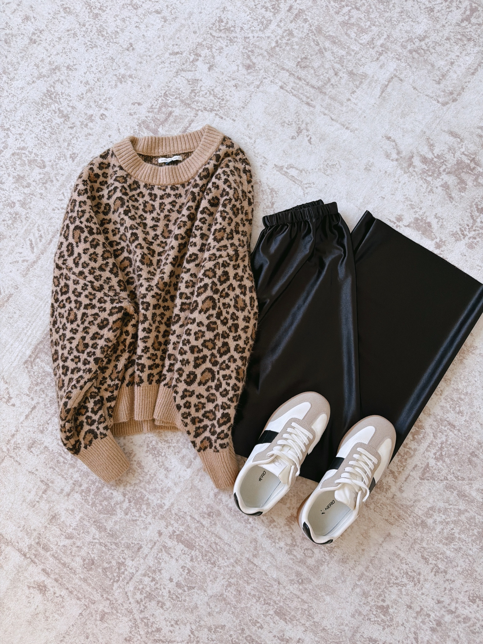 The best wrinkle free satin pants.. love it paired with this cozy af leopard sweater and casual sneakers for the perfect laid back look 

 #LTKootd #LTKmomlife #LTKMidsize