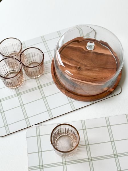 Some recent tabletop finds from Target include this glass dome and wood dessert keeper, these fluted juice glasses and these plaid cork placemats. home decor dining room decor Target finds spring decor 

#LTKhome #LTKfindsunder50 #LTKstyletip