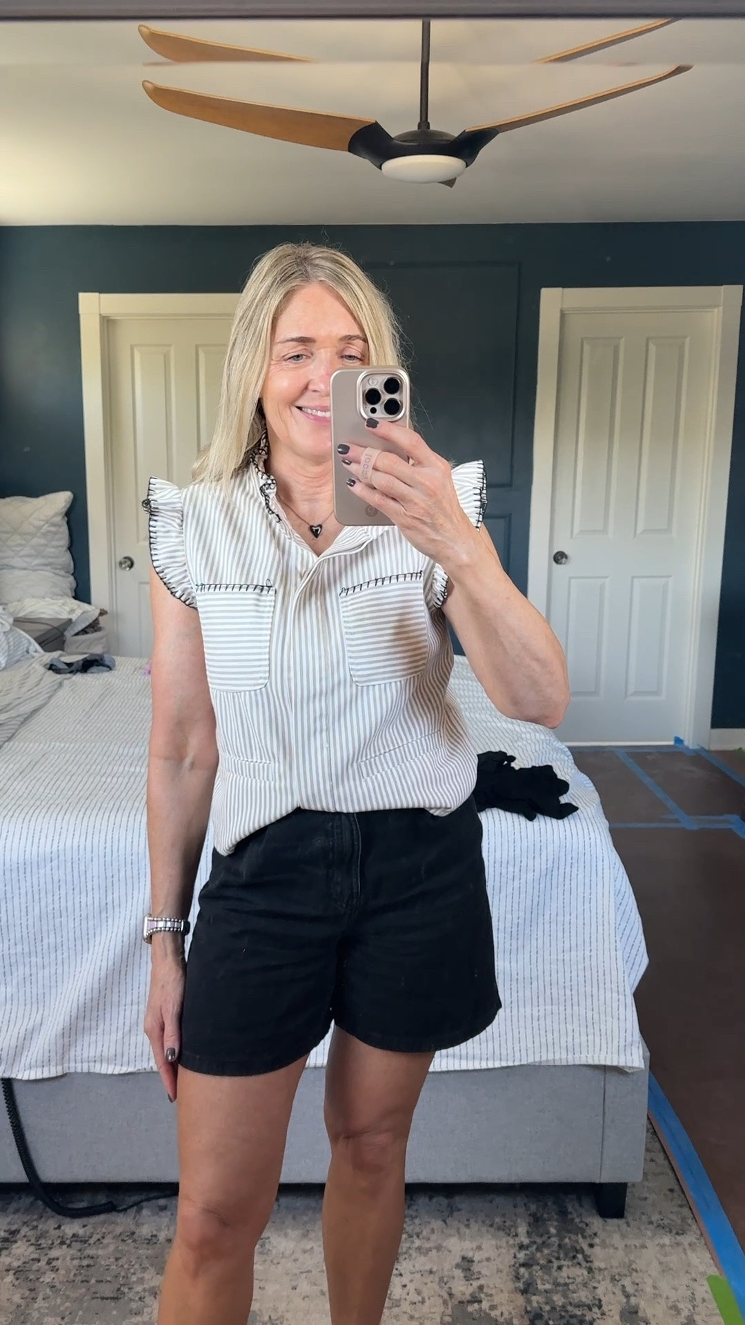 Summer outfit idea. Fall transition outfit. Vacation outfit. Outfits with shorts. Ruffled tops. Women’s vests. Black shorts outfits. Outfits with sandals. Anthropologie sandals.

#LTKootd #LTKSeasonal #LTKOver40