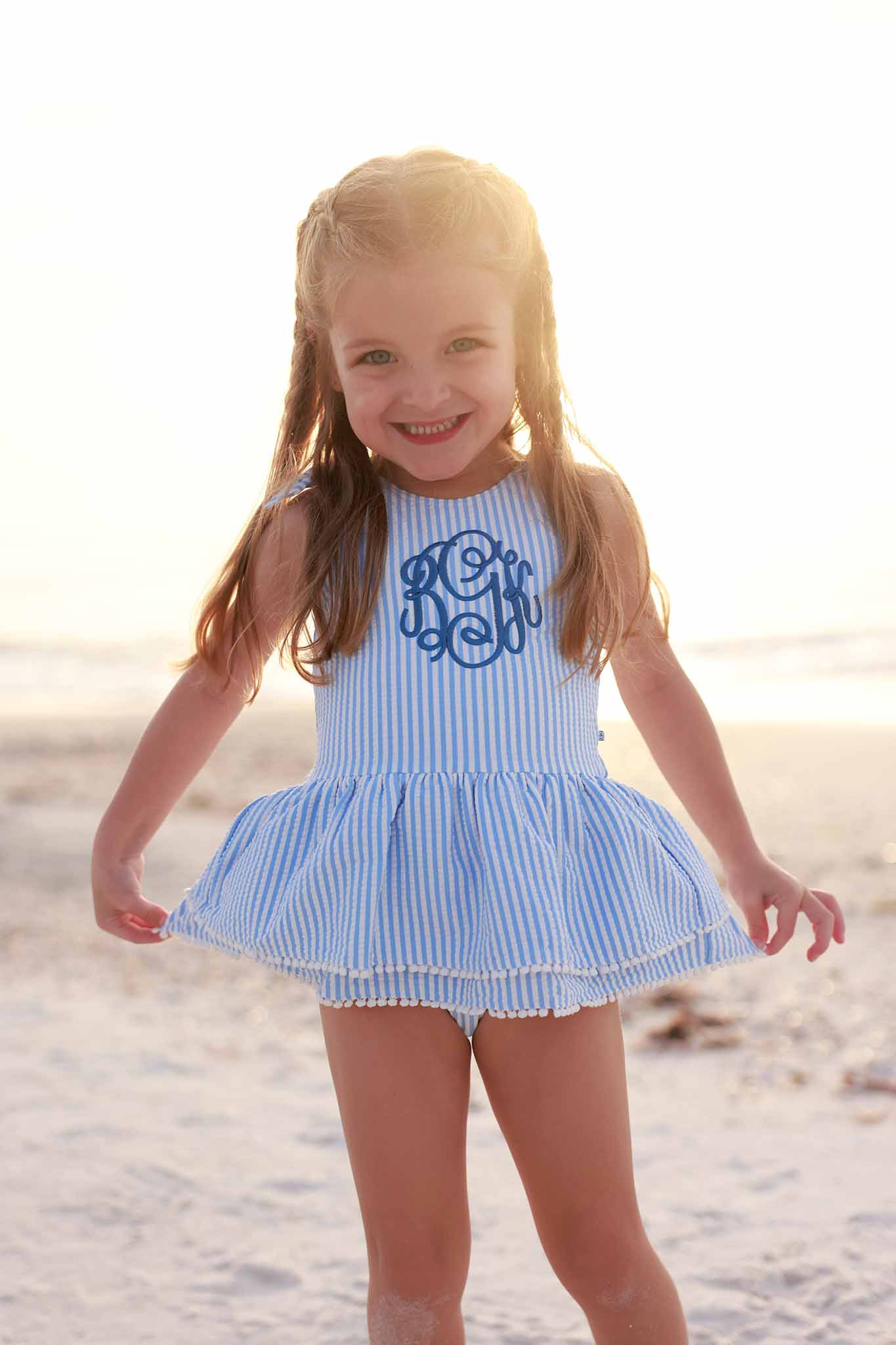 Tiered Skirt with White Pom Trim | Seersucker Blue | Caden Lane