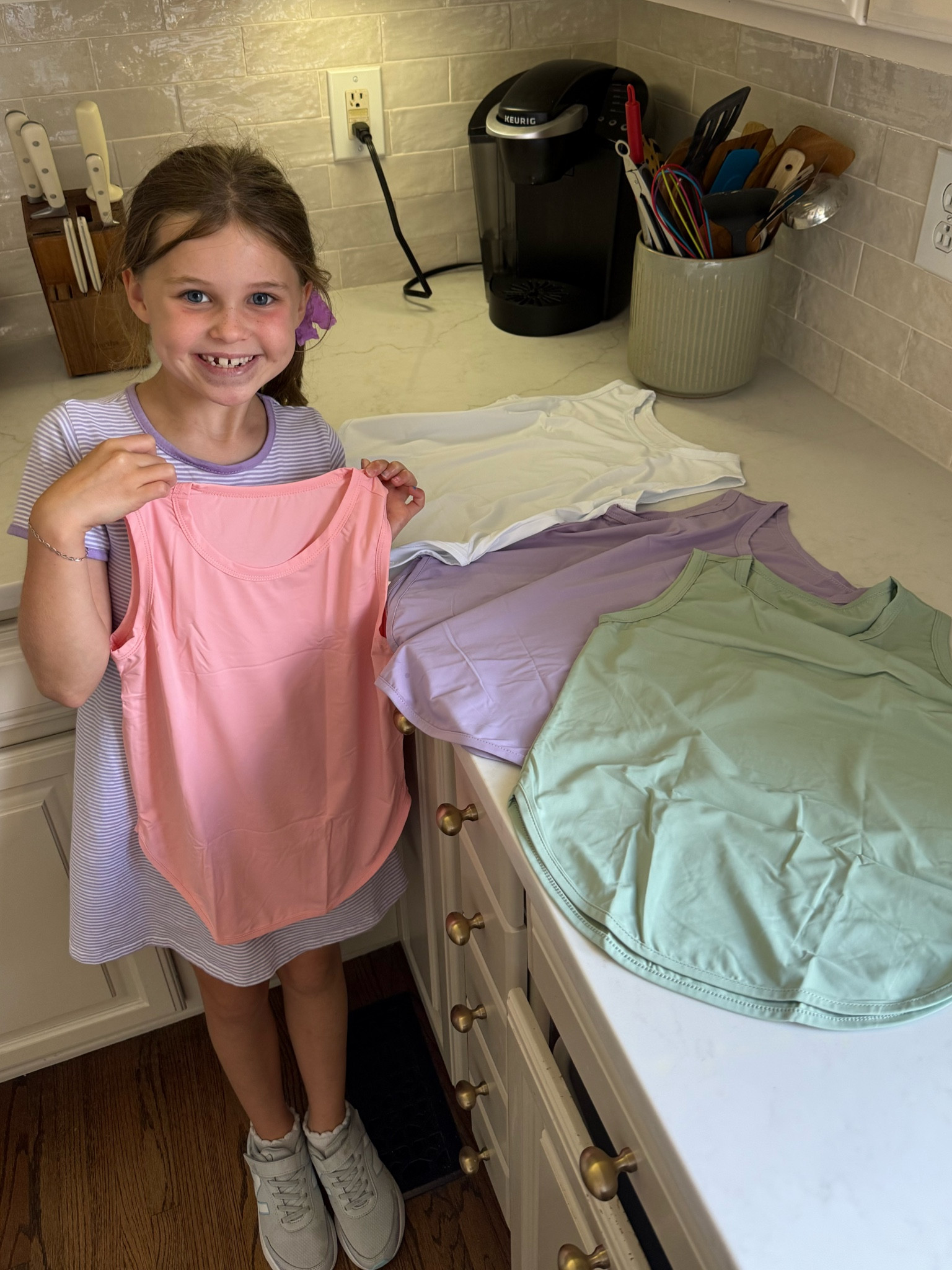 The best kids dry fit tanks! So so so soft and the perfect length!! Don’t show tummy but don’t hang long! 

#LTKKids #LTKSaleAlert #LTKActive