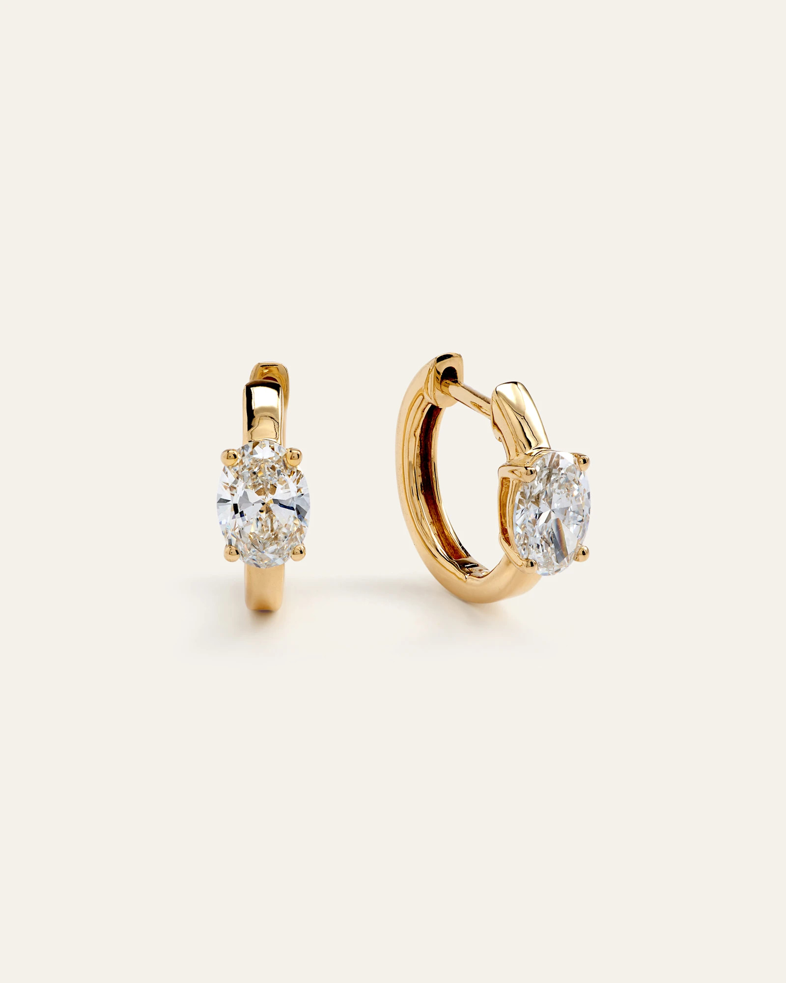 Quince | Women's 14K Gold Lab Grown Diamond Oval Solitaire Huggies 1ctw in White Gold | Quince