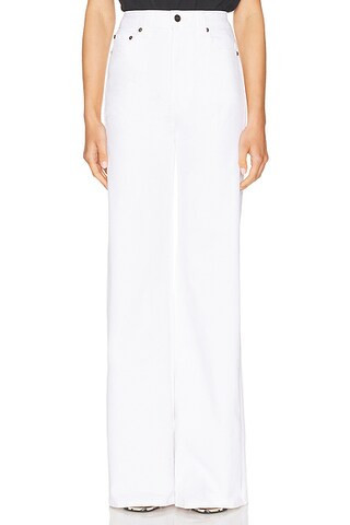 KHAITE Dane Flare Leg Jeans in White - White. Size 32 (also in ). | FWRD 