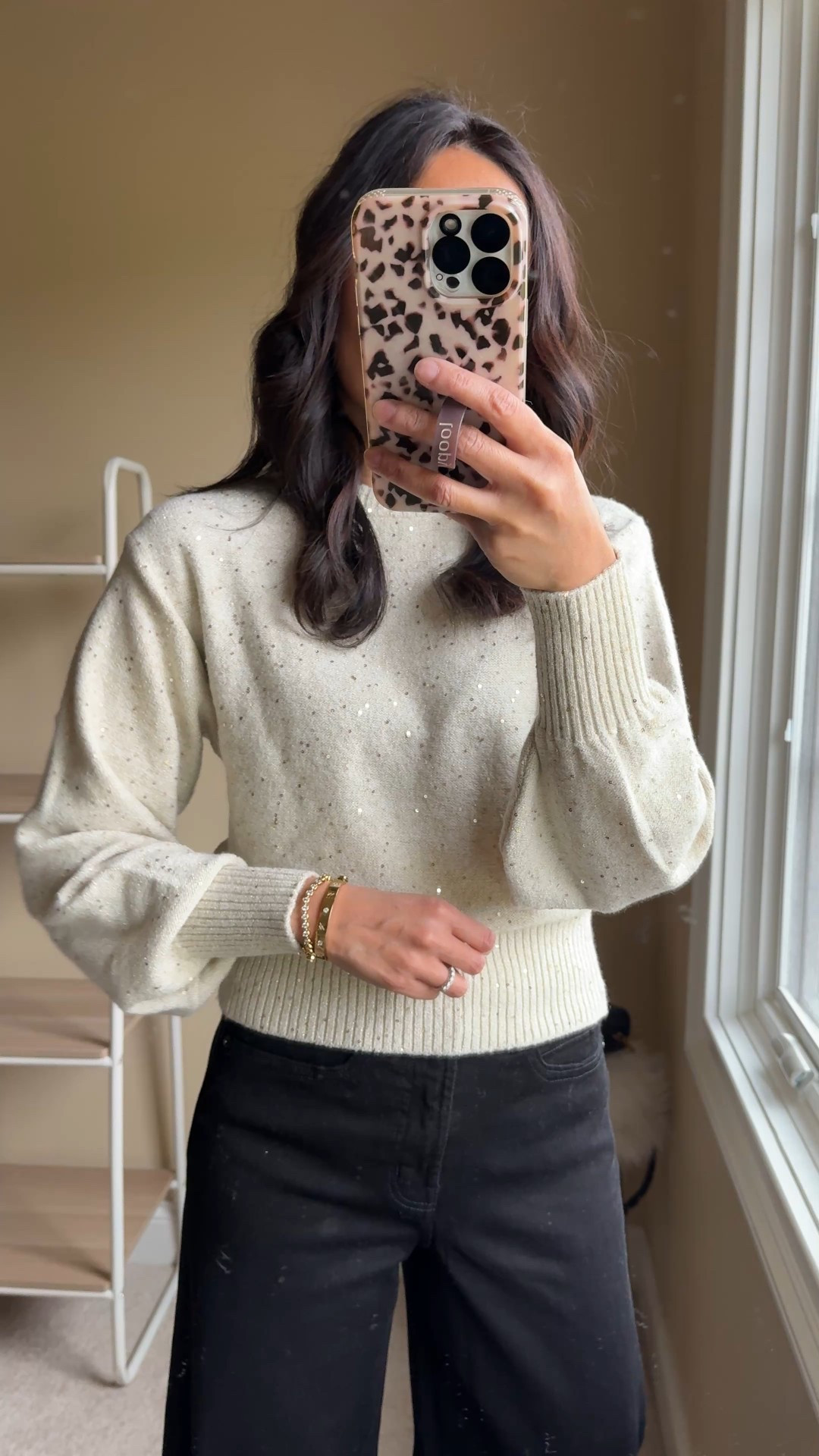 Warm new year’s eve outfit. NYE outfit. 
Subtle sparkle to this sweater. I would size up. 
Flare black jeans with stretch. True to size. 
Leopard booties. 


#LTKSaleAlert #LTKOver40 #LTKFindsUnder50