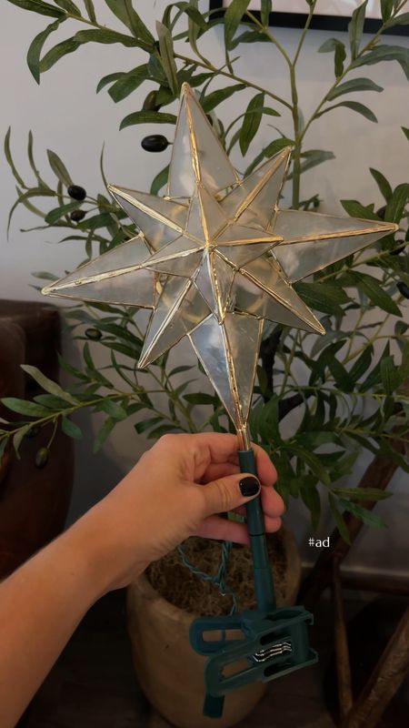 #ad I decorated the tree for the holidays with yet another  @loweshomeimprovement hidden gem: this capiz Christmas tree topper and some pretty white lights. Suddenly, this faux tree is looking extra cozy and even though I’m not a big seasonal decor person, I absolutely love the vibe it’s giving.

#lowespartner #christmasdecor #holidaydecorating #holidayhome #holidaystyle #olivetree #lowes #lookforless #diychristmas #viral #decoratingonabudget Holiday decorating. Holiday home decor. Home decor on a budget. Faux olive tree. Modern traditional home. Christmas diy. 

#LTKfindsunder50 #LTKhome #LTKHoliday