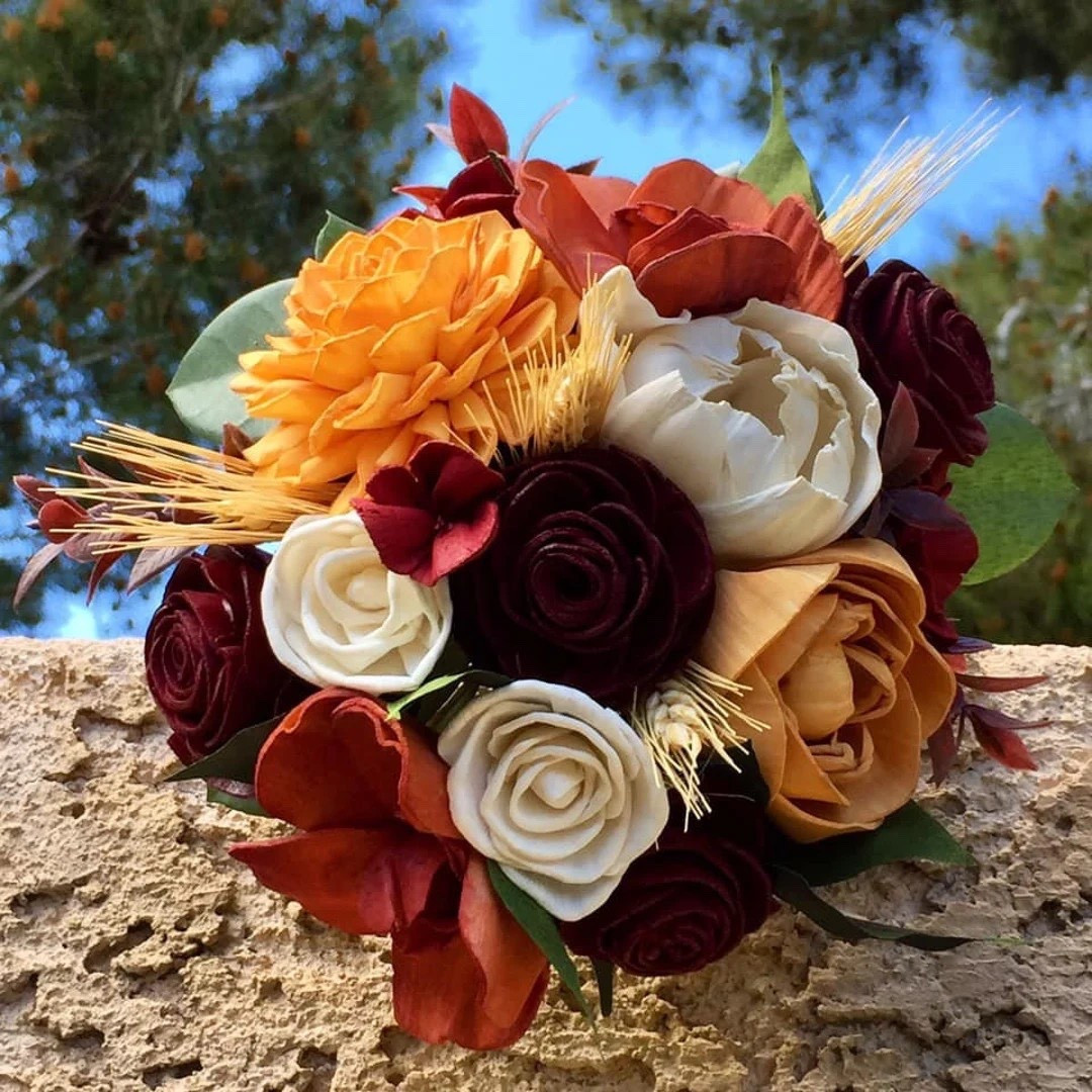 Designed to be treasured forever, this handcrafted sola wood bridal bouquet by ForeverFlowersbyGigi blends timeless romance with eco-conscious beauty. Each balsa wood bloom is carefully hand-painted or dip-dyed and arranged with delicate fillers and greenery for a lush, natural look—without the worry of wilting. Choose ivory satin for a classic finish or burlap for a rustic touch, and customize your colors to perfectly match your palette, including Behr paint shades. Lightweight, allergy-friendly, and available in multiple sizes and styles (including cascade), it’s a stunning keepsake for your wedding day and beyond.

#LTKWedding #SolaWoodFlowers #EcoFriendlyBride #BridalBouquet #RusticWedding #ClassicBride #WeddingDetails #EtsyWedding

#LTKHome #LTKSeasonal #LTKWedding