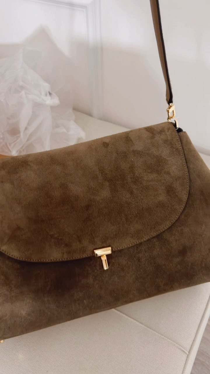 My newest bag, love the suede, It’s pretty big, has lots of space, love the quality and the gold details. 

#LTKOver40 #LTKootd #LTKU