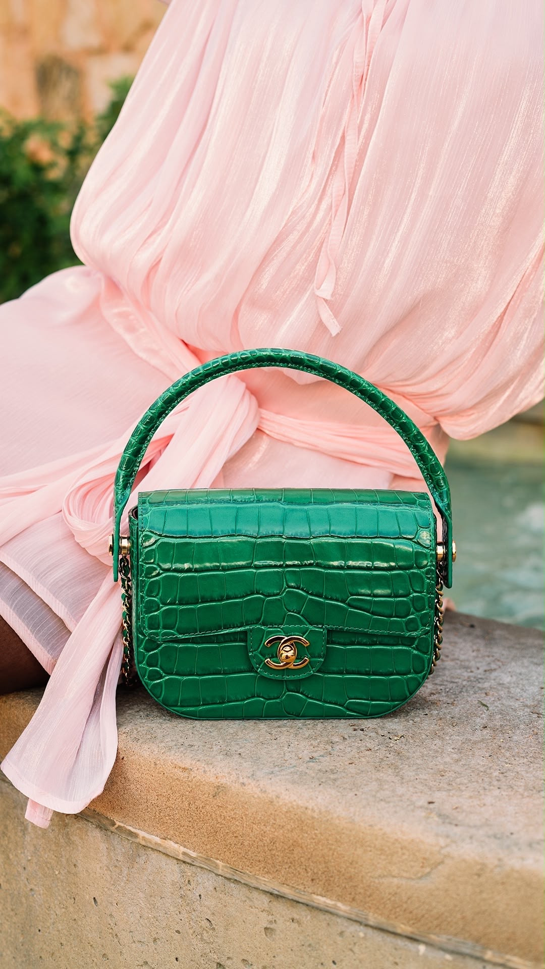 The Green Statement

A closer look at the structured green Chanel bag, with glossy croc-effect texture, a curved top handle and signature gold hardware. The saturated green stands out beautifully against the soft pink backdrop.

#LTKstyletip #LTKbag #LTKFashionMonth