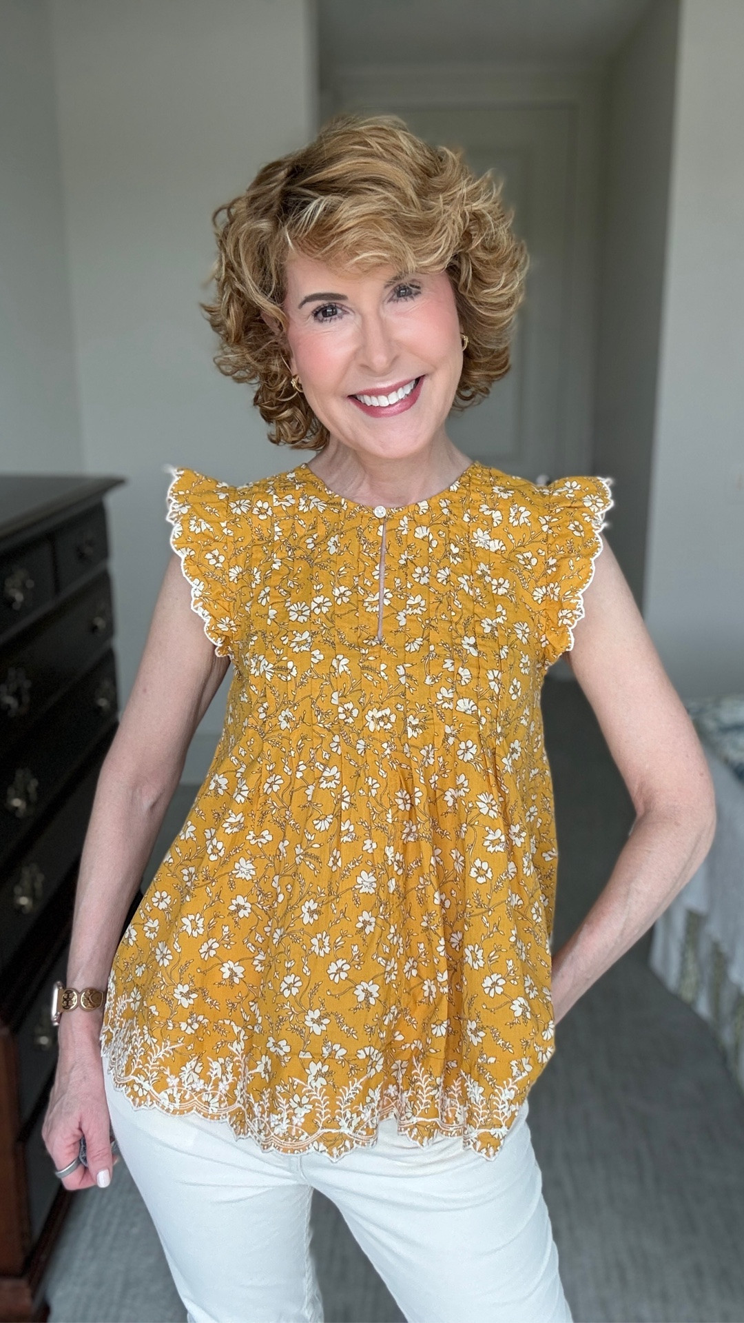 Easy fall outfit with a gold floral blouse featuring flutter sleeves, front pleats, an embroidered border hem, and a relaxed flowy fit. I paired it with cream corduroy jeans and gold sneakers for a casual fall look that’s polished, comfortable, and perfect for fall fashion over 50.

#LTKootd #LTKOver40 #LTKgrwm