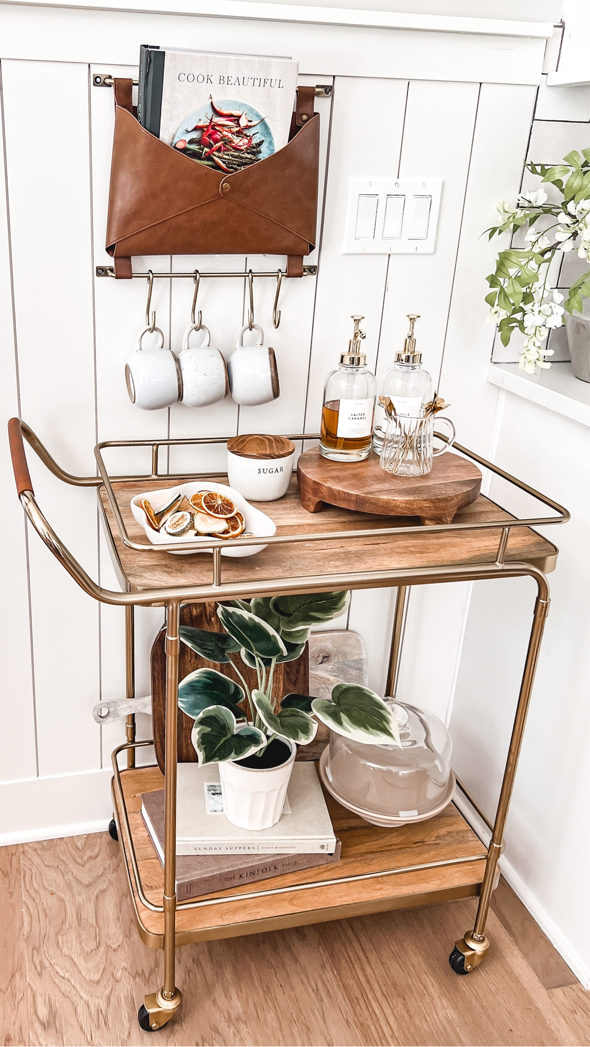 I had a  blank wall in my kitchen and for the longest I couldn’t figure out what to put here.  I decide to go with this cute bar cart! I don’t drink so I decided to use it as a flavoring station or storage area and may eventually add a coffee maker. This cart is So pretty! It’s a must have!✨

#LTKhome #LTKstyletip