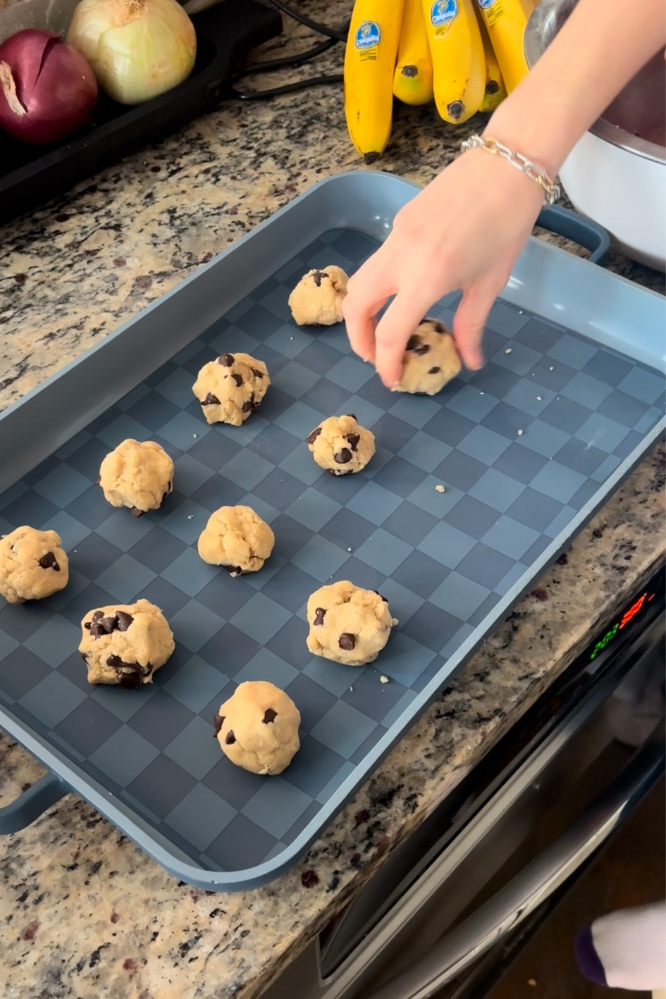 Cookie recipe below!! And linking My fav Baking pan + silicone mat! 

Preheat oven to 350
In medium bowl sift together 1.5 cups flour, 1 tsp baking soda, 1/2 tsp salt 
In another bowl, beat together 1/2 cup ROOM TEMP butter, 1/2 cup firmly packed brown sugar, 6 tablespoons granulated sugar for 2 minutes with electric mixer until smooth
Add 1 egg + 1 tsp vanilla extract  and mix on low

Gradually add flour mixture to butter mixture. Mix until just combined - don’t overmix. 

Add 1.5 - 2 cups chocolate chips and stir with wooden spoon. 

Form into balls and bake 10ish minutes until barely golden brown. Sprinkle with a little sea salt when you remove from oven. Then transfer to wire cooling racks  

#LTKHome