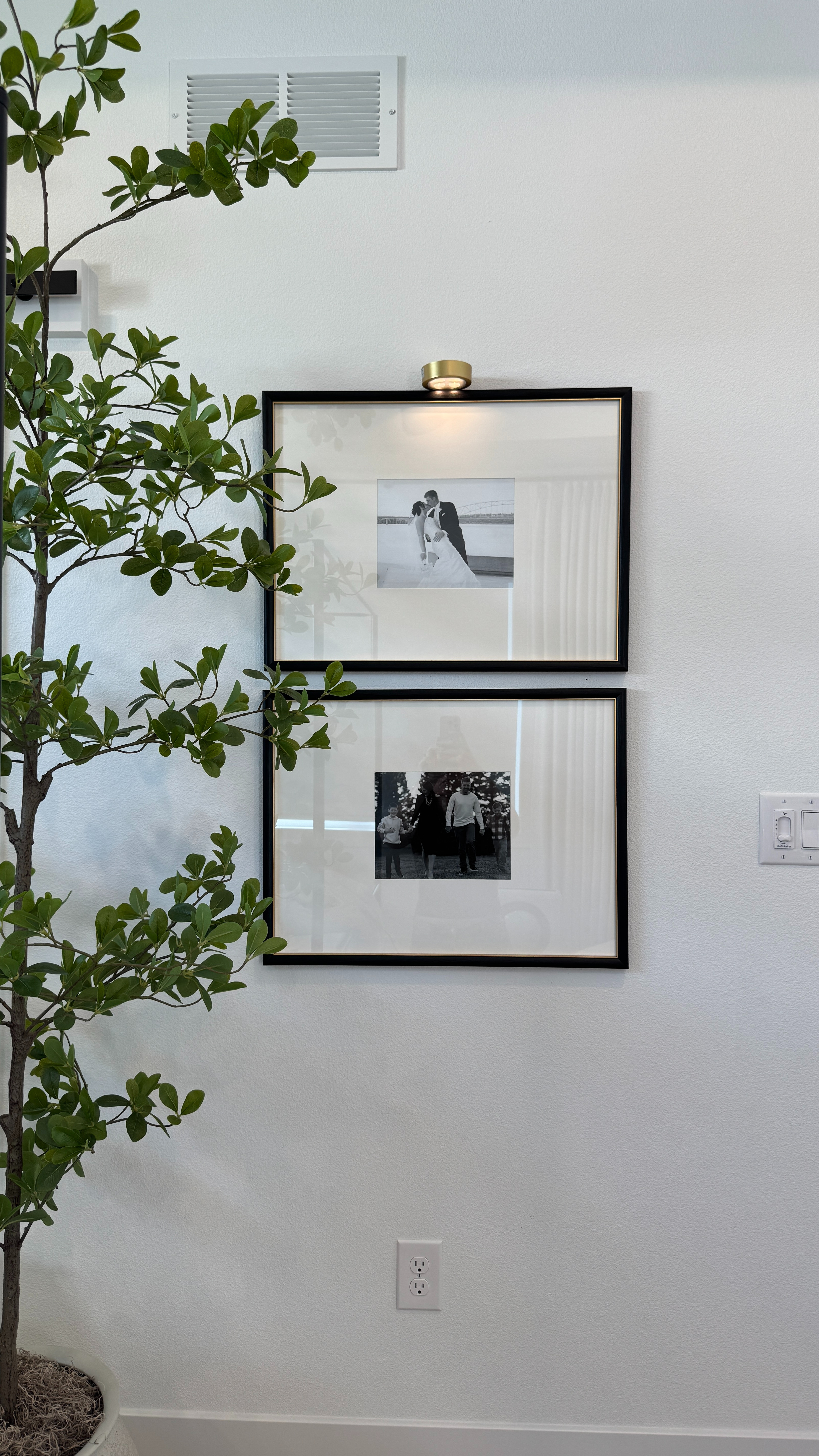 If you love easy lighting upgrades… this is it ✨ and they’re finally on sale! They're the perfect light for our frames and make this wall a little more special.  

 

#LTKHome #LTKSaleAlert