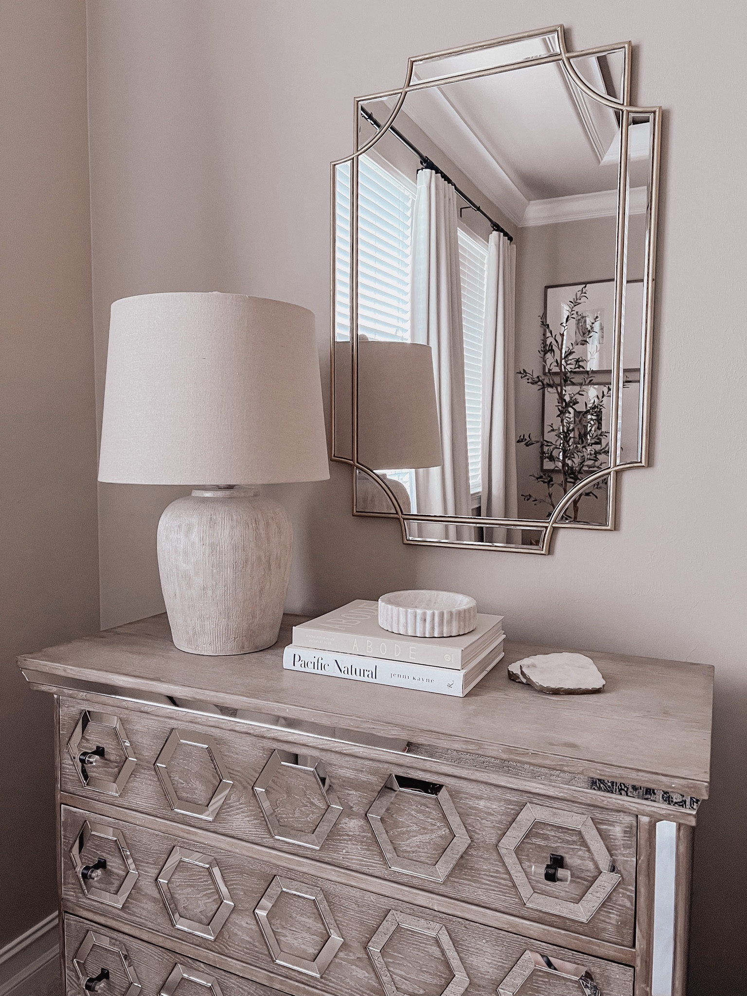 Bedroom, home decor, decor, bedroom decor, neutral decor, table lamp, lamp, books, coffee table books, marble dish, marble bowl, mirror, brass mirror, olive tree. 

#LTKhome