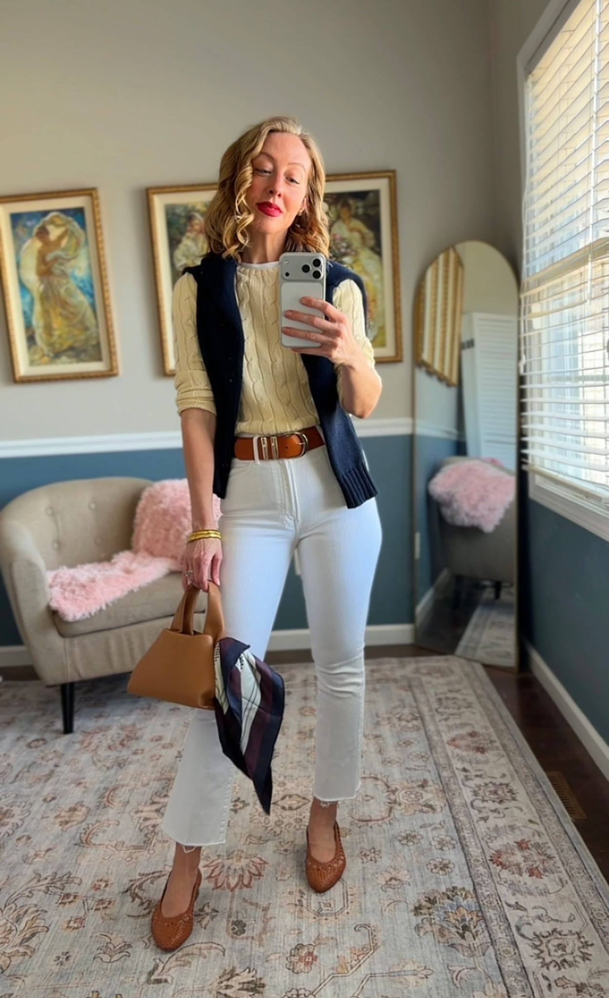 Cream cable knit short-sleeve sweater styled with white straight-leg jeans, a brown leather belt, woven leather flats, and a structured tan handbag.

Classic spring outfit idea with timeless American style.

Polished, everyday look for work, lunch, or casual outings.

#LTKootd #LTKSeasonal #LTKOver40