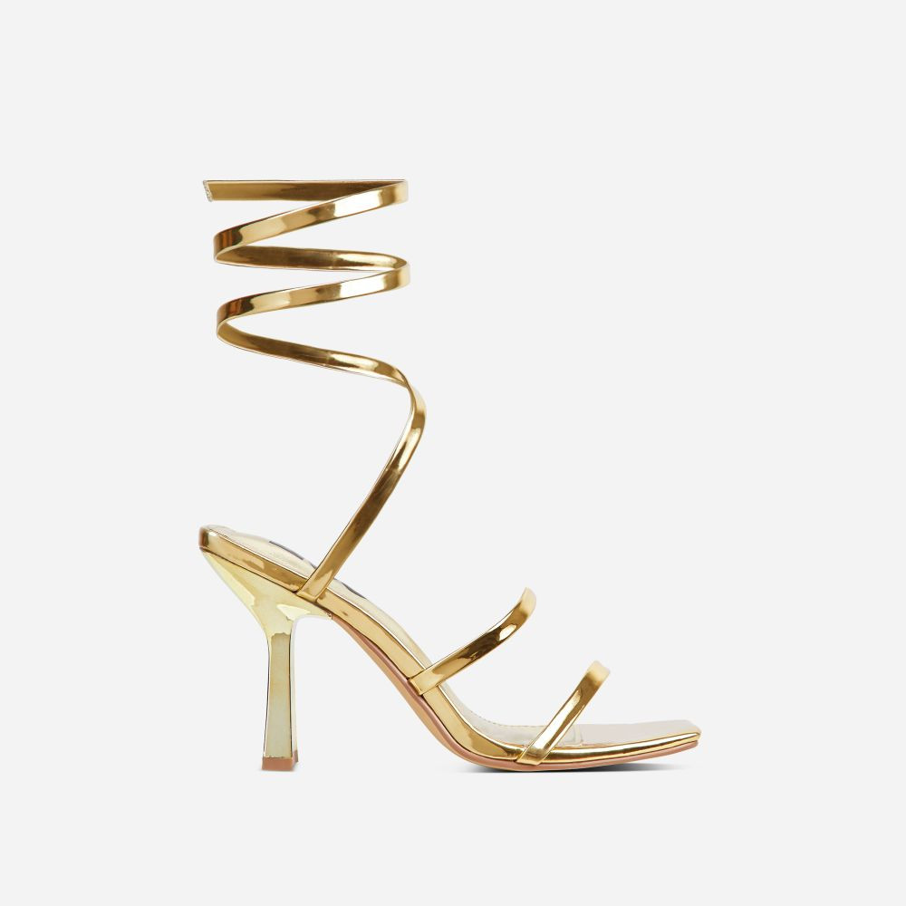 Marsha Wrap Around Strap Detail Square Toe Thin Flared Block Heel In Gold Patent | EGO (UK)