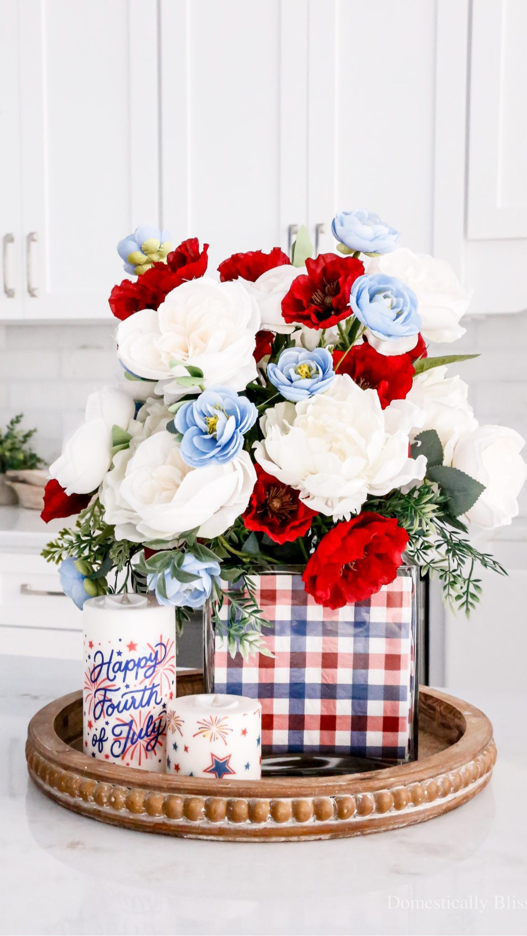 A simple 4th of July Napkin Centerpiece using Independence Day napkins and faux red, white, and blue flowers.

See details:
https://domesticallyblissful.com/4th-of-july-napkin-centerpiece/

#LTKSeasonal #LTKHome #LTKvlog