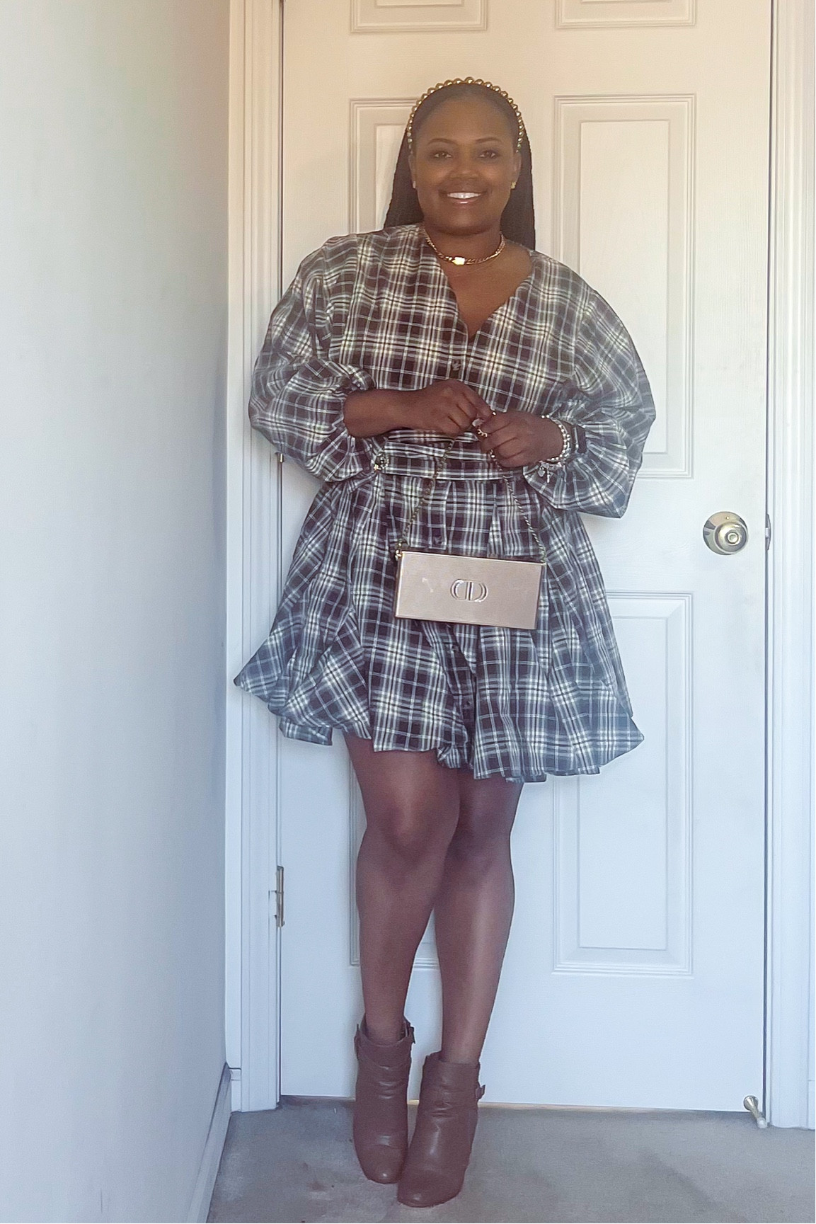Transitioning to fall in style with this plaid belted mini dress from Dillard’s Clearance Center, paired with classic brown booties and gold accessories for that touch of luxe. ✨ The final touch? A brooch strategically placed to close the matching cloth belt! Pro tip: Brooches are the perfect accessory to elevate any look—pin them on a blazer lapel, add them to a handbag strap, or even use them to cinch a scarf. How do you style your brooches for a luxe look? Comment below! 👇🏾 #FallFashionInspo #LuxeForLess

Follow for more fall outfit inspiration and luxe styling tips! 

transition to fall, plaid mini dress, Dillard’s clearance center, brown booties, gold accessories, fall fashion inspiration, how to wear a brooch, affordable luxury, luxe fashion tips, designer accessories, brooch styling ideas, fall outfit ideas, fall style tips, affordable fashion finds, Simpli Luxe style, chic fall looks, elevate your style, fall wardrobe essentials, luxury on a budget, versatile accessories

#LTKStyleTip #LTKOver40 #LTKSeasonal