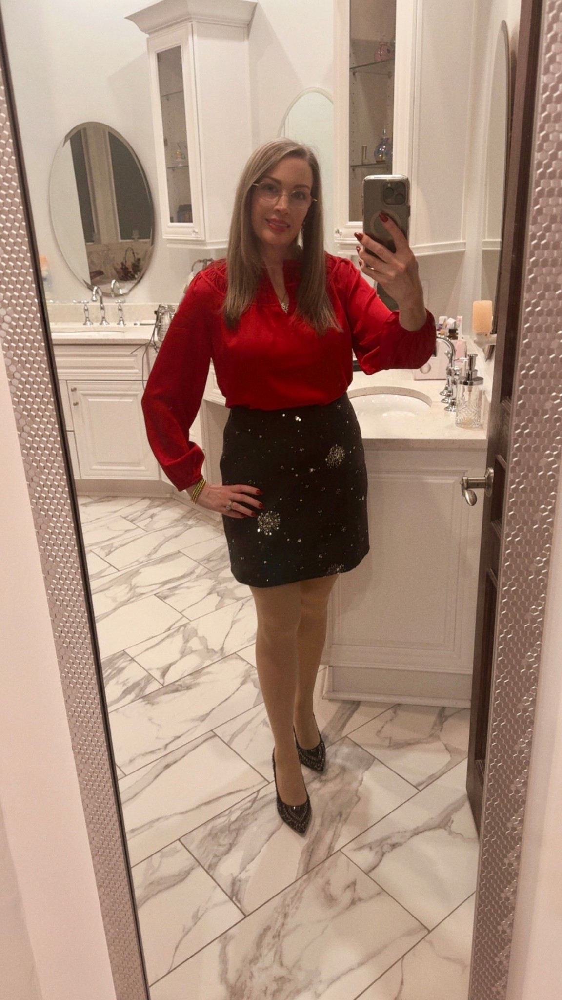 Holiday party ready in this top from Talbots and skirt from LOFT. 
The top is lightweight, with a slit v-neck, and a comfortable elastic band on the sleeves. When it’s untucked, it hits me just above my hip bones. I’m wearing a petite small.
The skirt from LOFT is so festive and fun! It has a side zipper with hook closure for that seamless look. It has some stretch to it and is easy to sit in. I’m wearing a size average 4. 
I’m loving these tights! They are silky smooth. There was a little extra length to them but that was easily distributed to the top half. They are not too thick and have two seams in the back that give you a little lift in the rear. I’m wearing a S/M. 
Im wearing the smooth shaping bra from truekind in a size M. 
#holidayattire #holidayparty #talbots #loft #tights

#LTKHoliday #LTKootd #LTKPetite