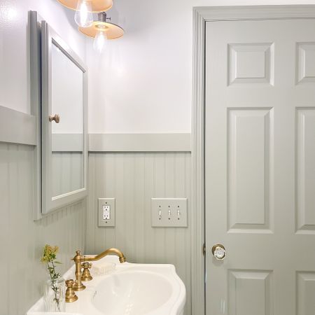 Guest bathroom transformation. Brass faucet. Brass vanity lighting. Vintage style Pedestal sink. Medicine cabinet mirror. 

#LTKsalealert #LTKfamily #LTKhome