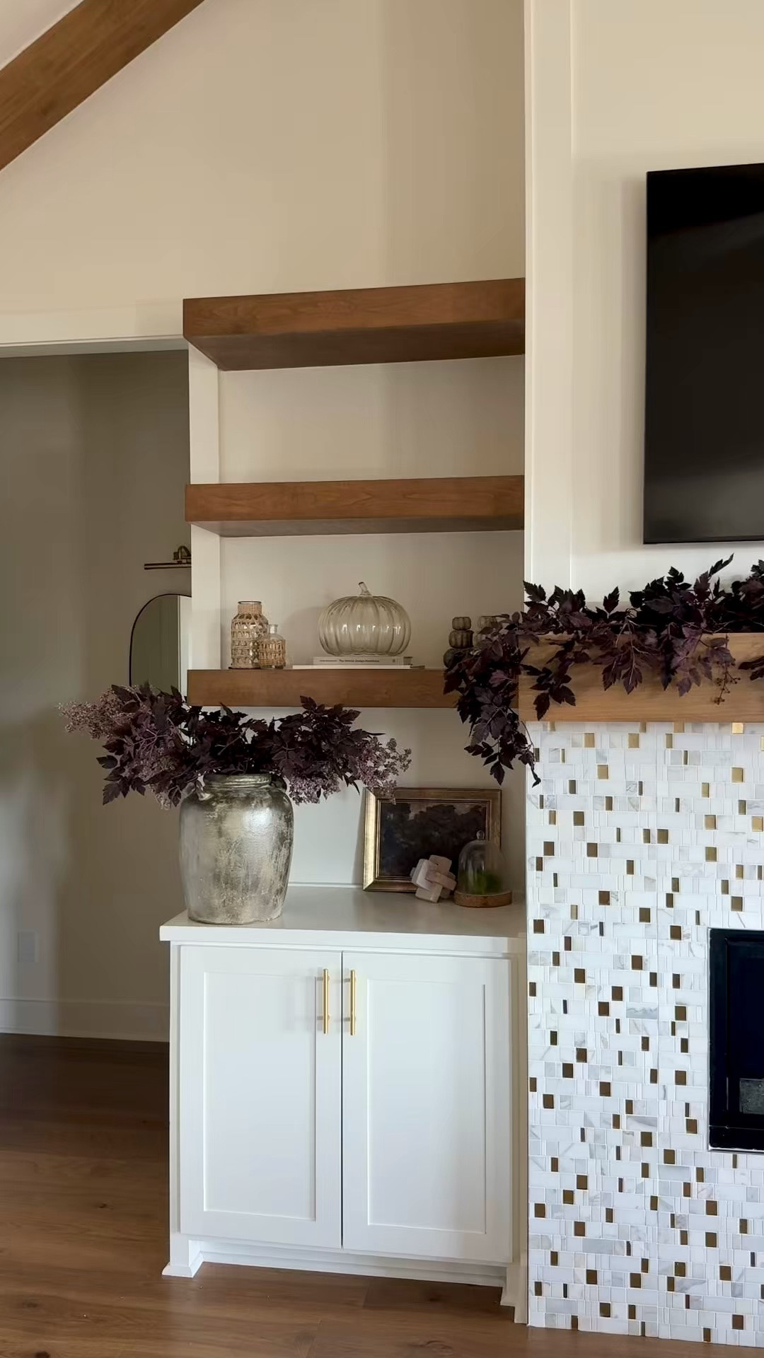 Simple fall styling in our living room 🤍 I kept it easy this year — just swapped in some deep fall stems and draped a cimicifuga garland along the mantel and built-ins. Such a small change but it makes the whole space feel like fall. Linking everything here!

#LTKSaleAlert #LTKHome #LTKSeasonal